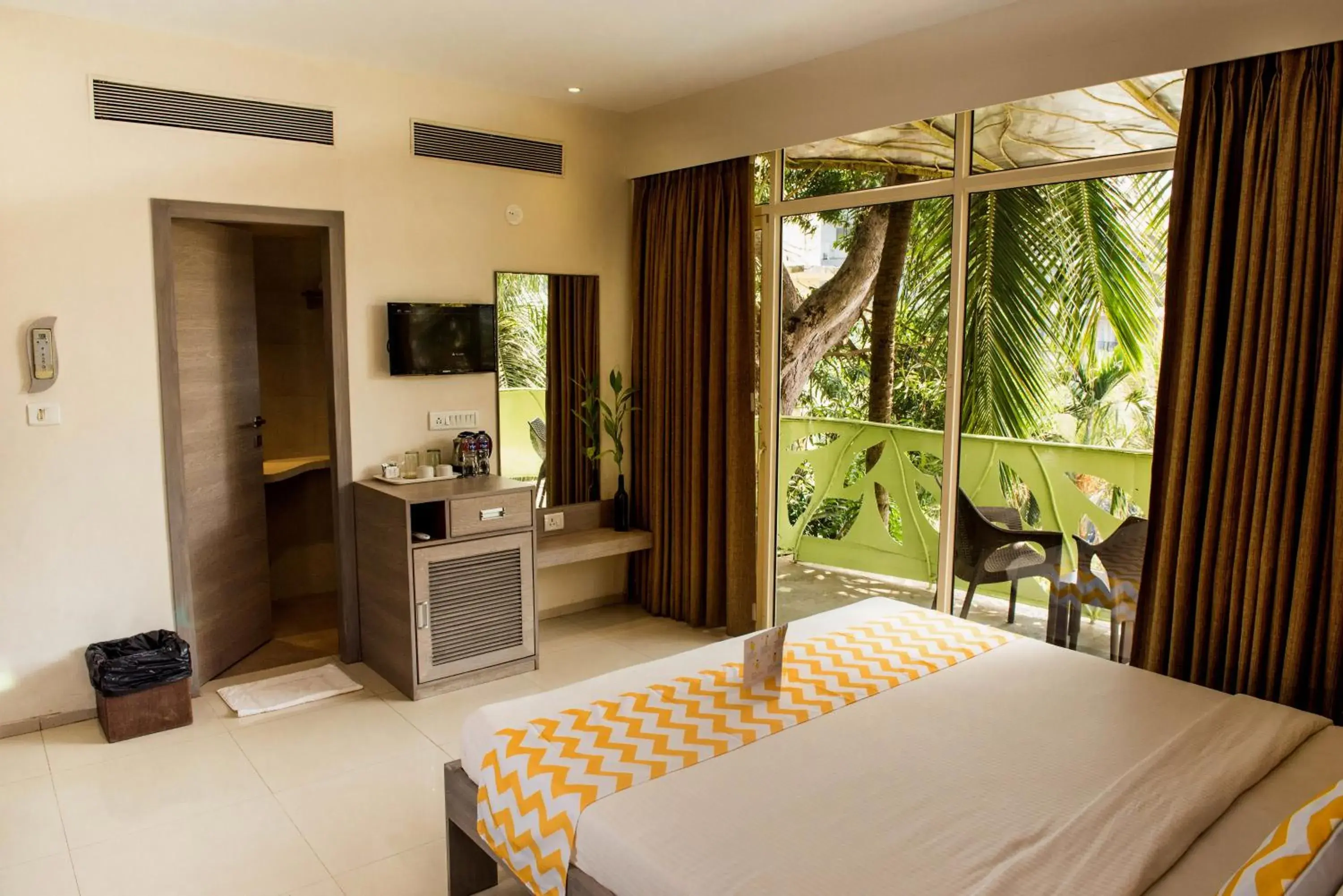 TV and multimedia, Bed in Sharanam Green Resort TV and multimedia, Bed in Sharanam Green Resort