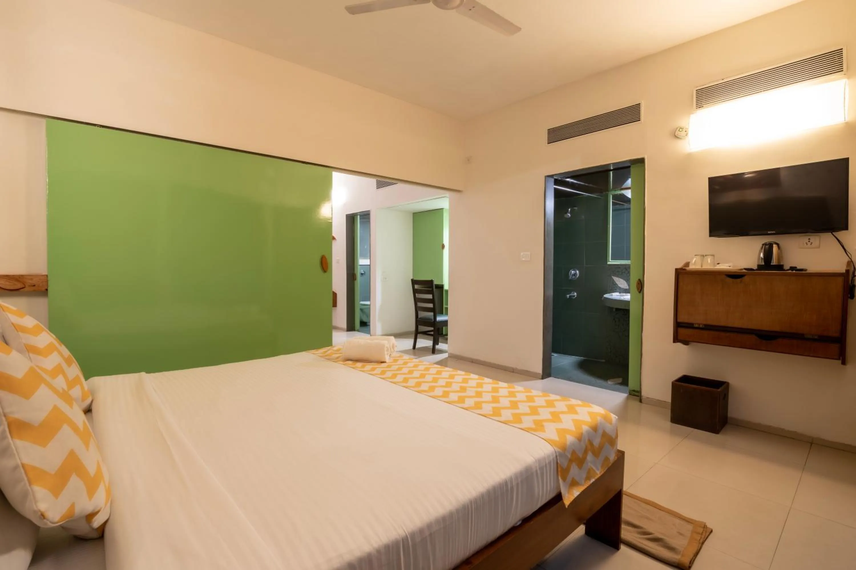 Bed in Sharanam Green Resort