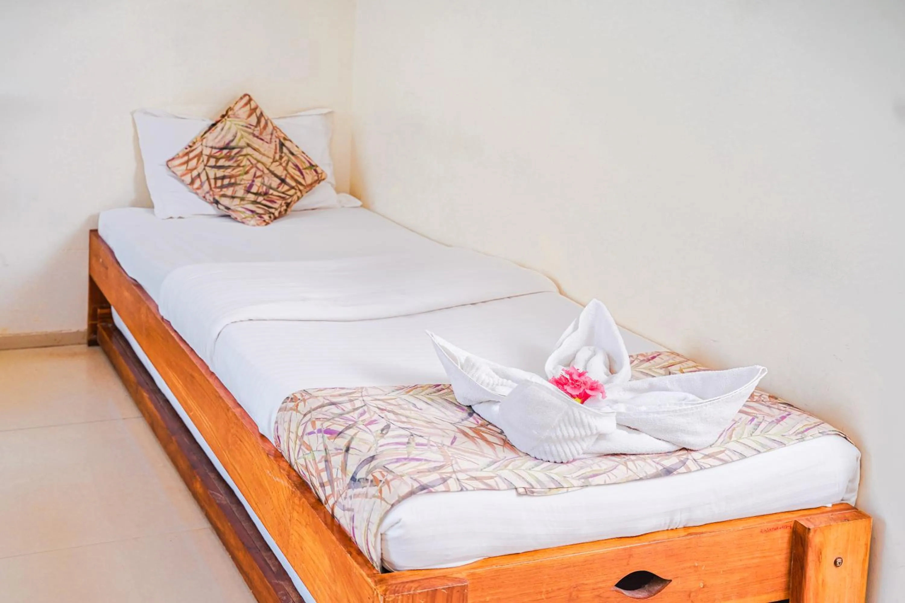 Bed in Sharanam Green Resort