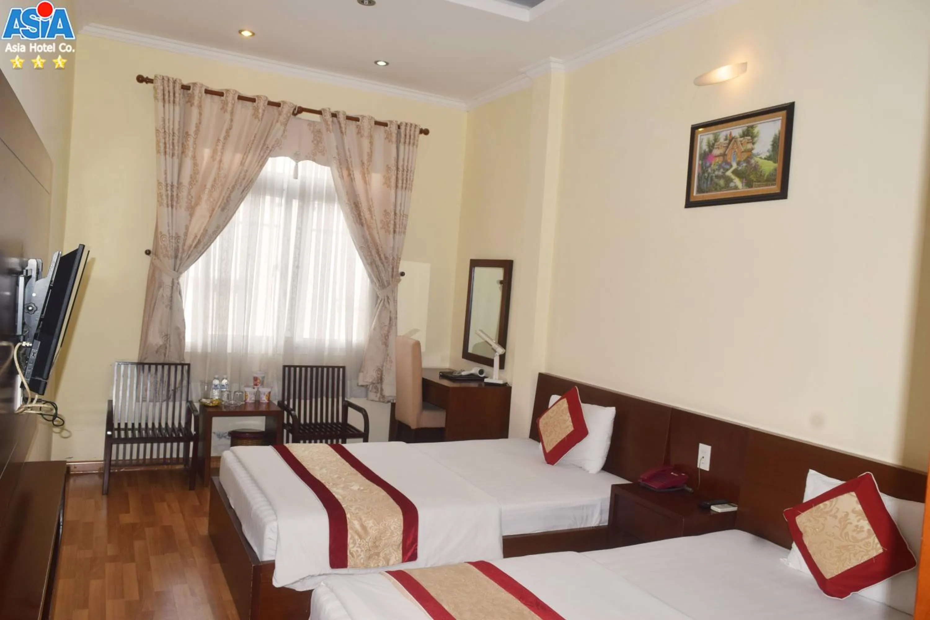 Living room, Bed in Asia Hotel Can Tho