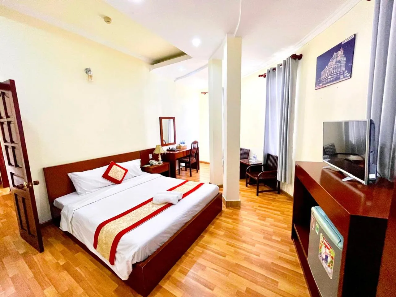 Communal lounge/ TV room, Bed in Asia Hotel Can Tho