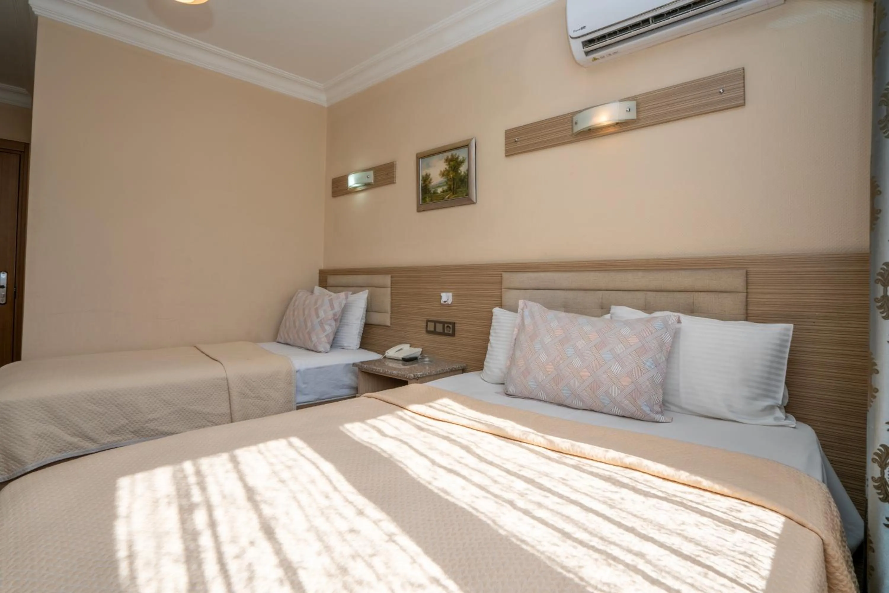 Bed in Grand Reis Hotel