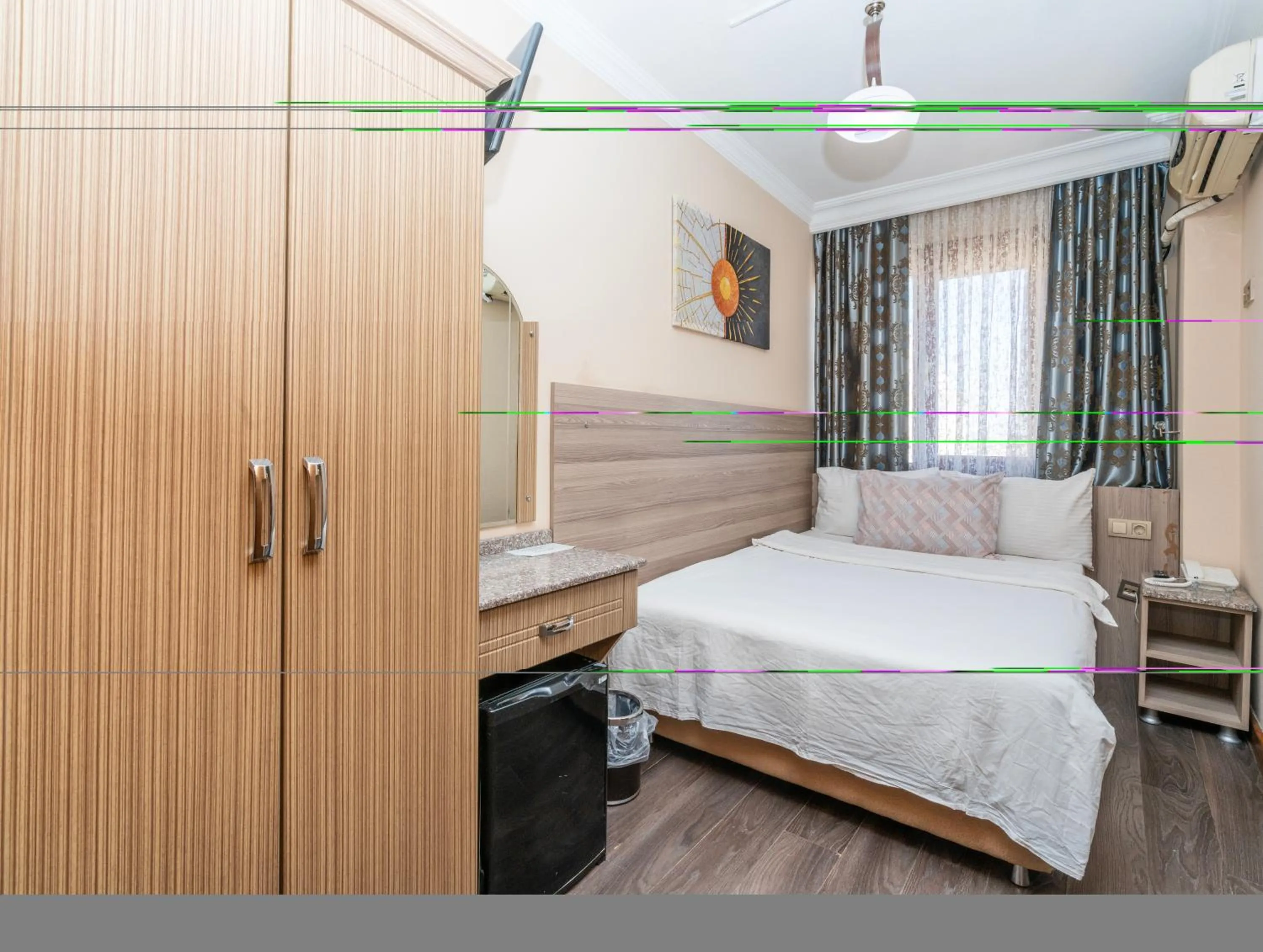 Bed in Grand Reis Hotel