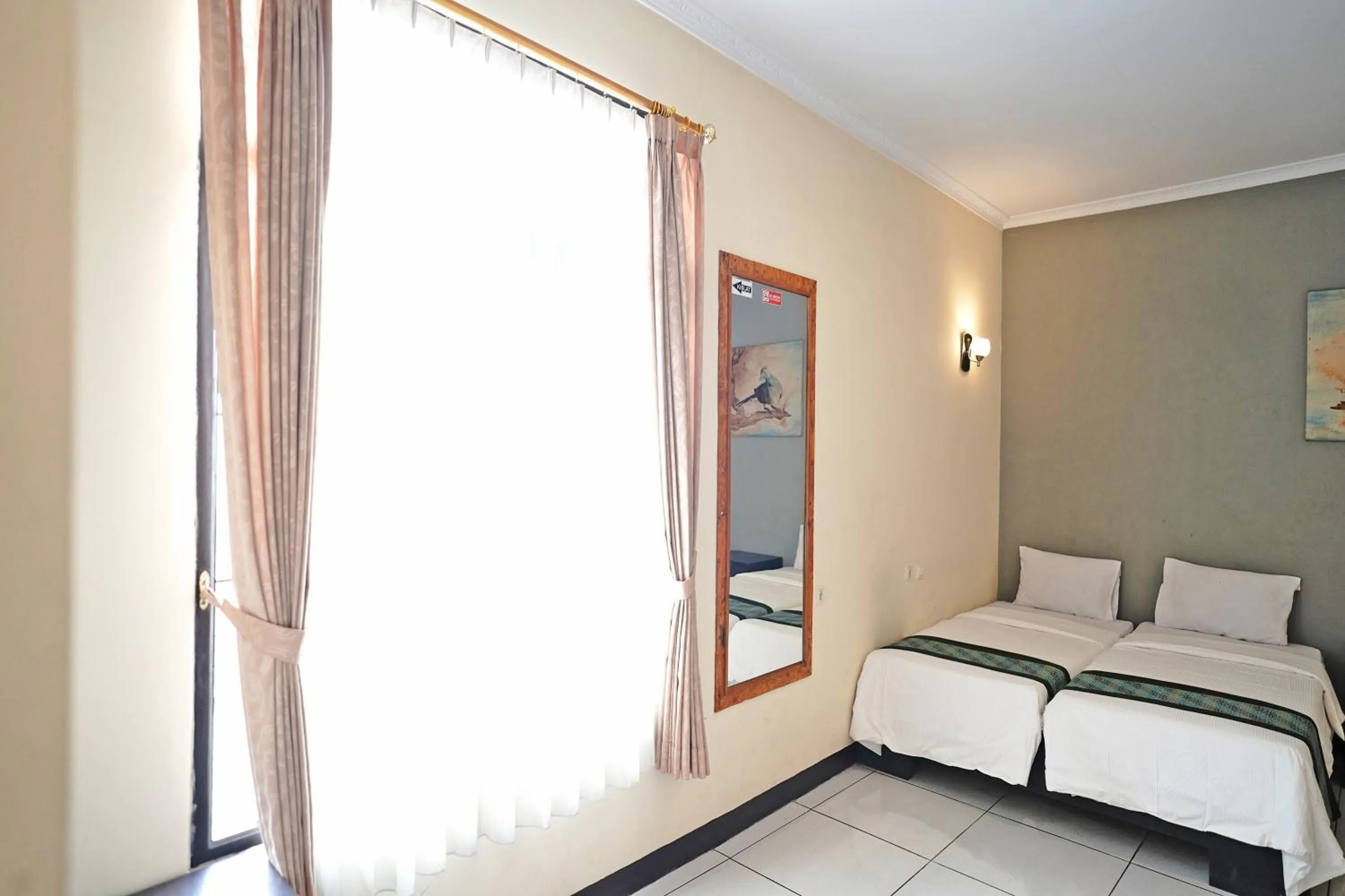 Bed in Saung Balibu Hotel