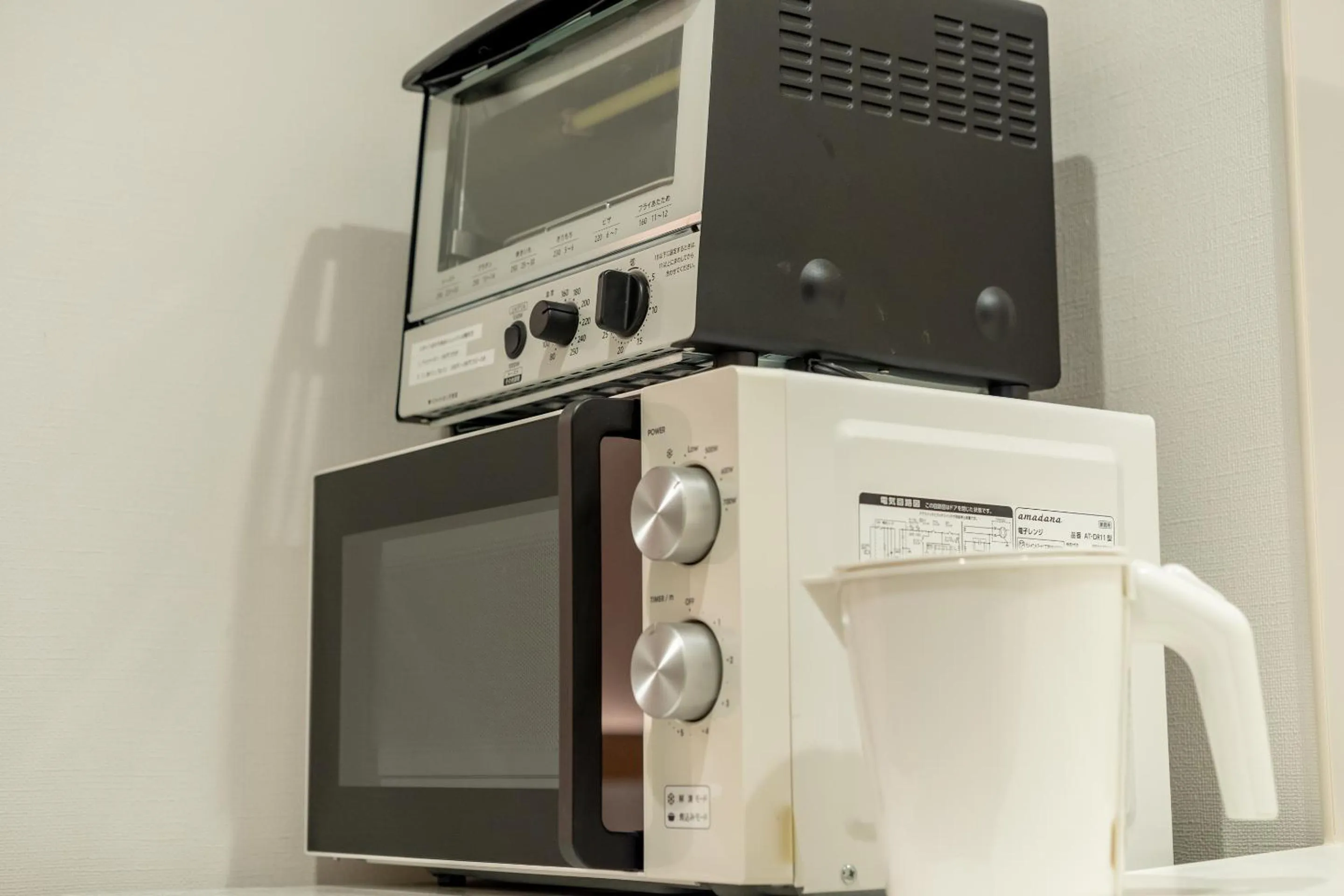 microwave in RESI STAY Hachi Inn