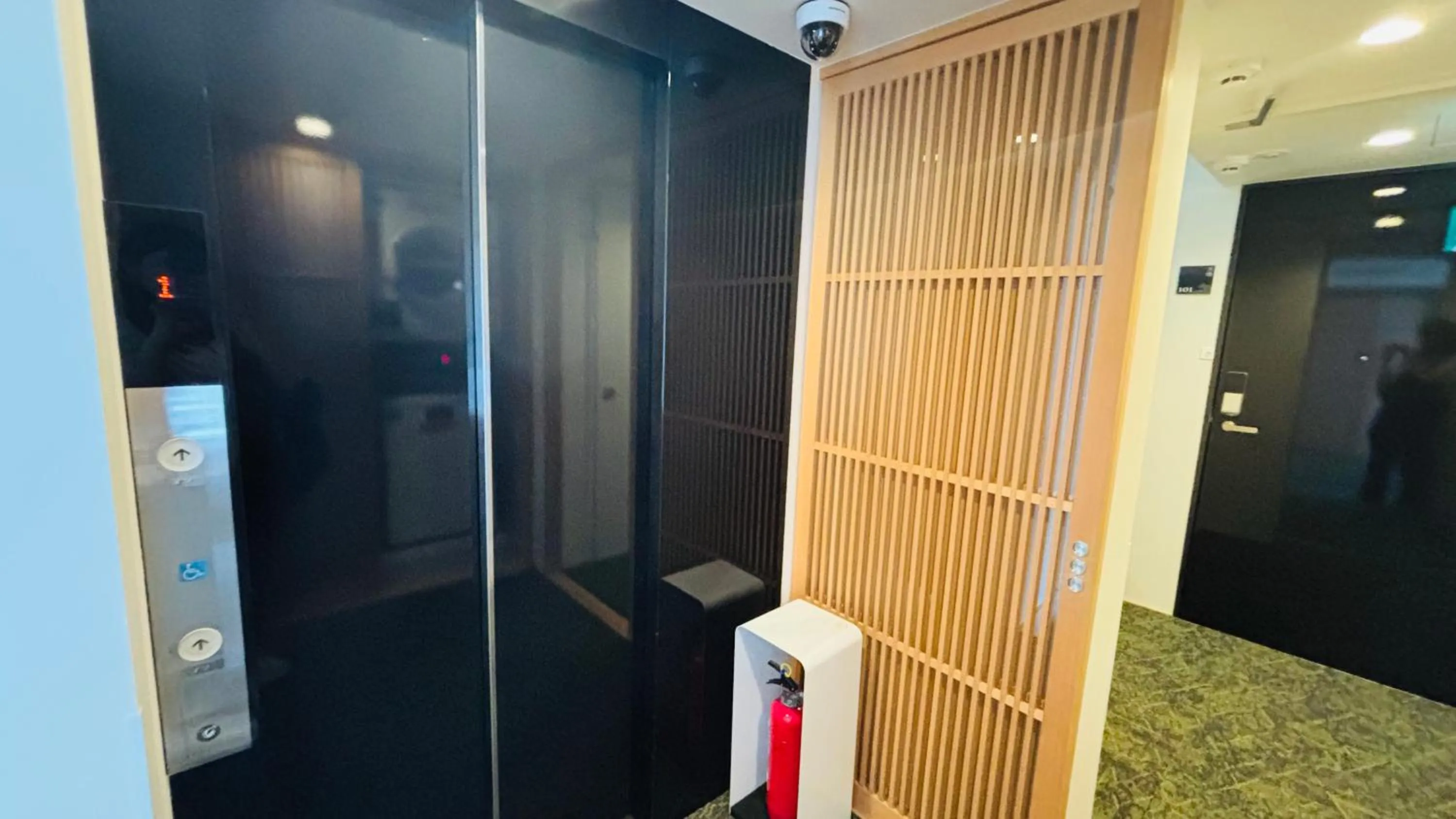 elevator in RESI STAY Hachi Inn