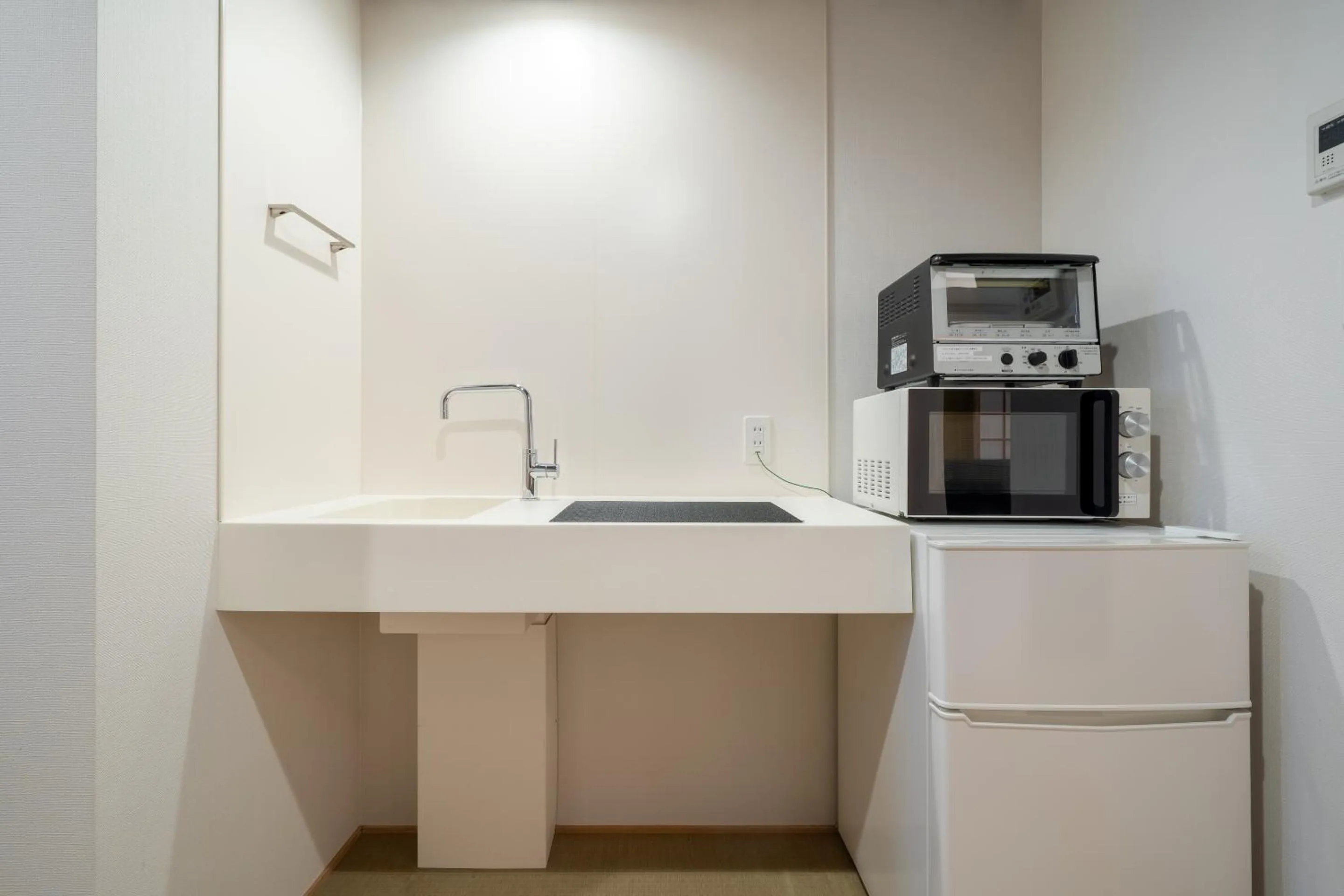 Kitchen or kitchenette in RESI STAY Hachi Inn