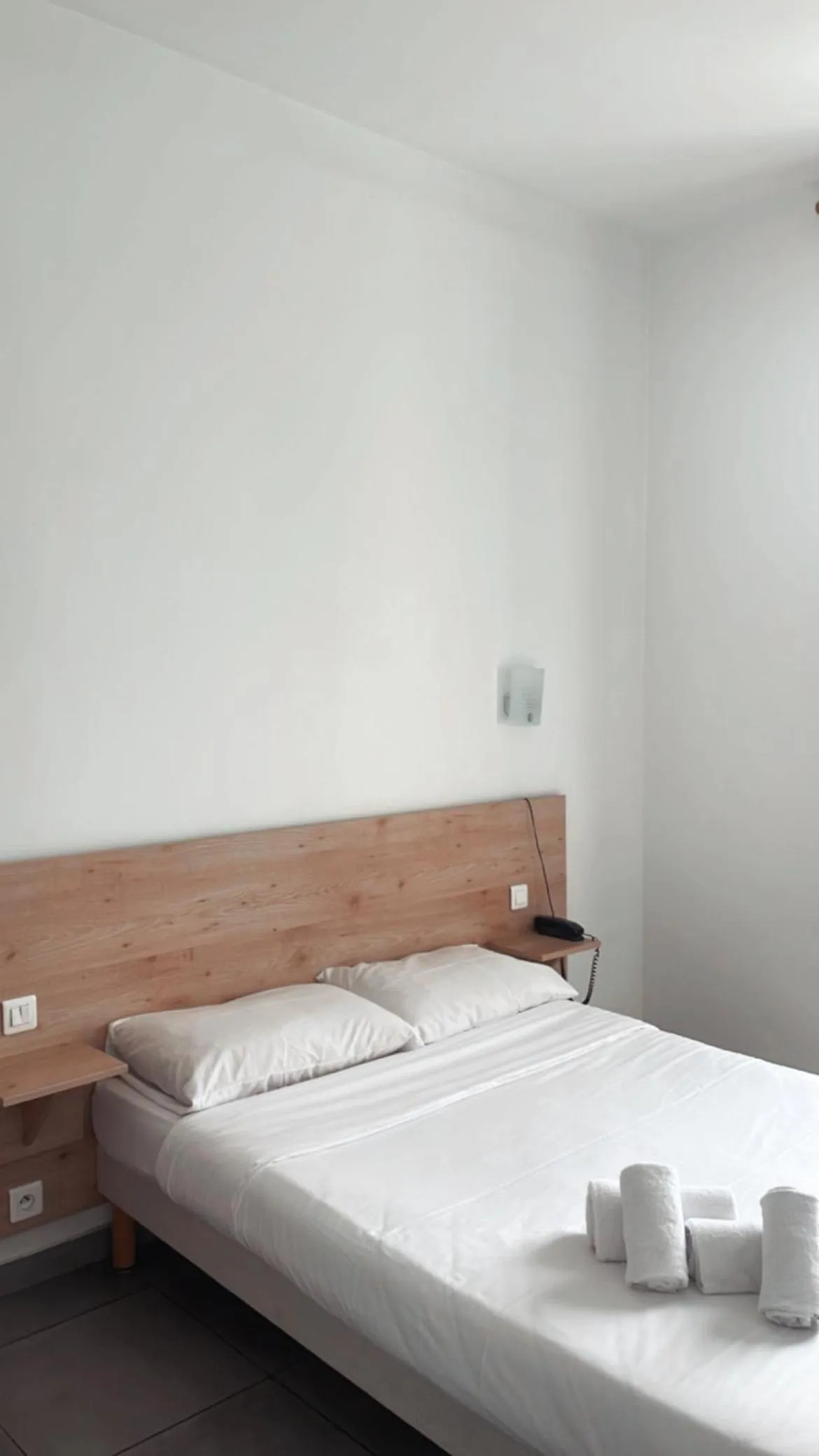 Bed in Hotel Riviera