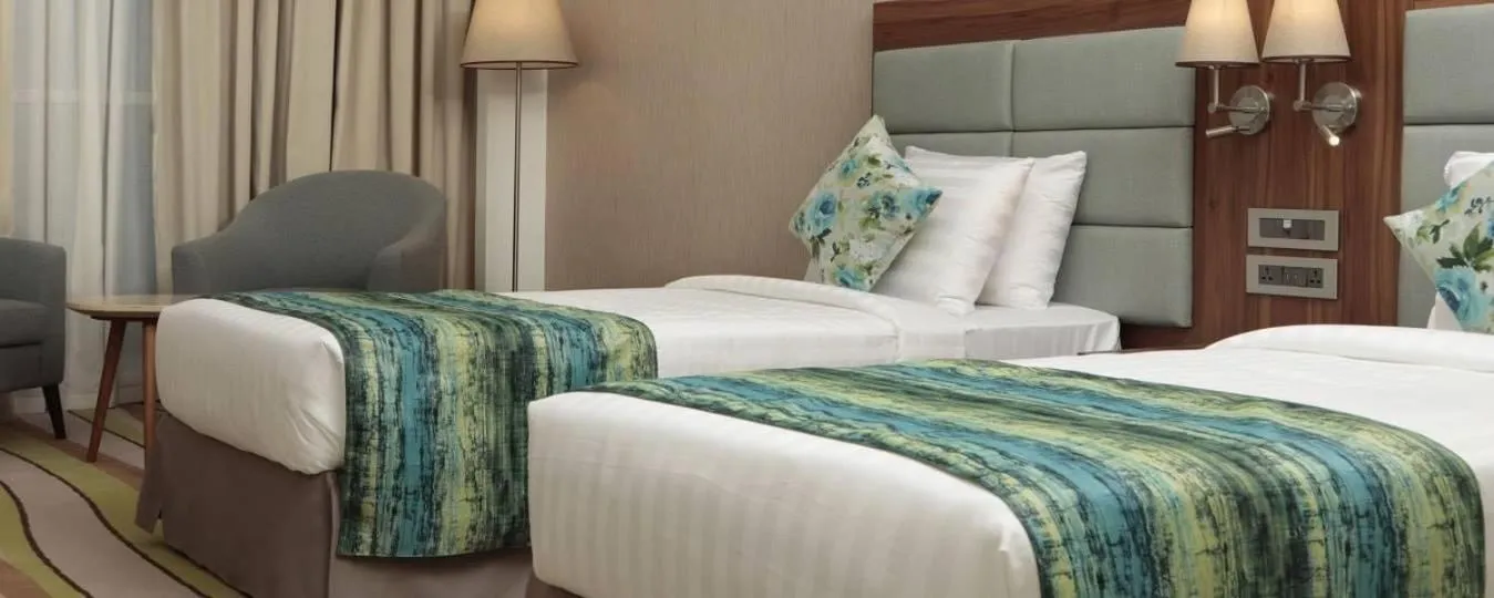 Bed in Jacob's Garden Hotel