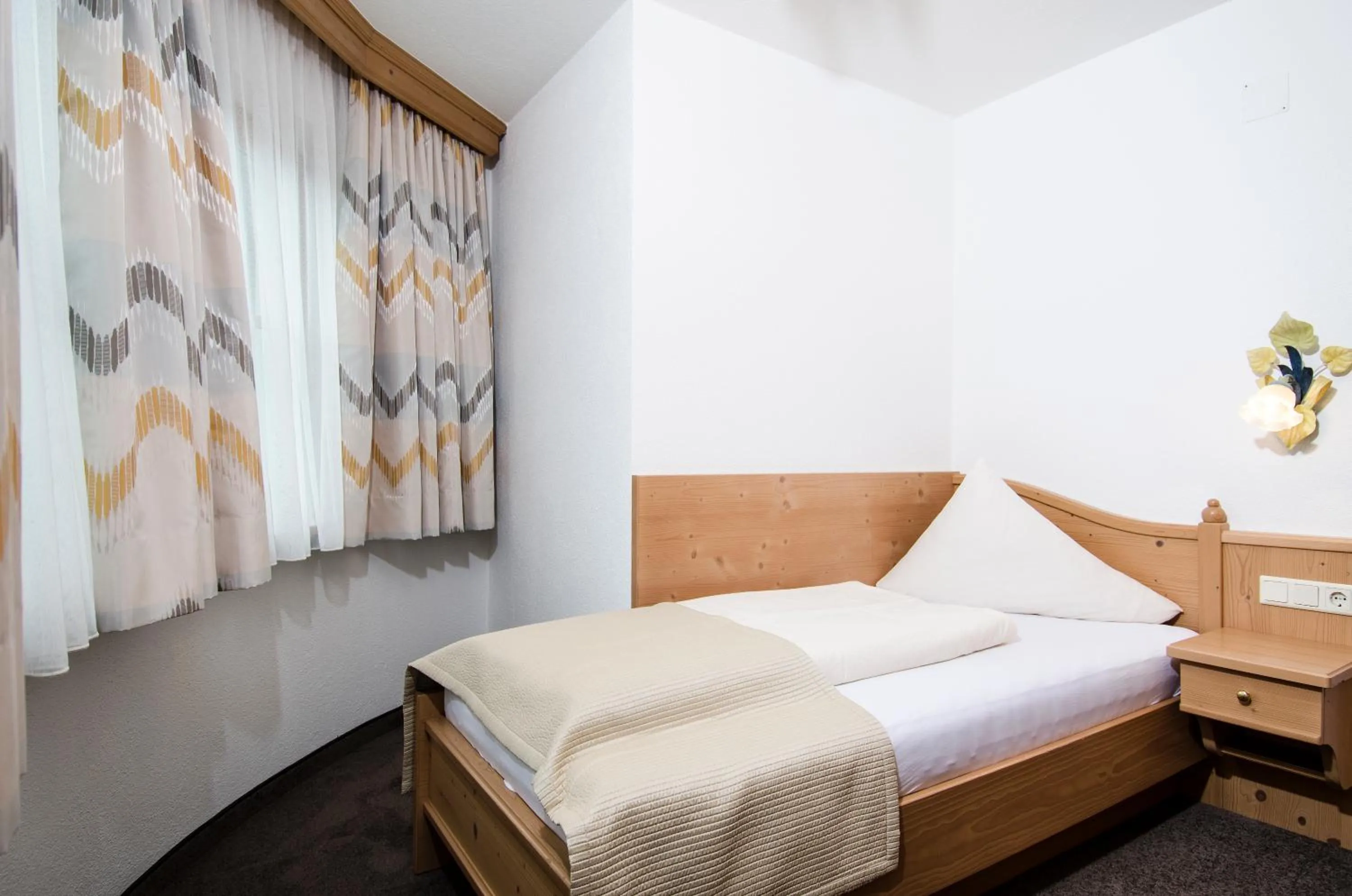 Bed in Hotel Garni Subretta