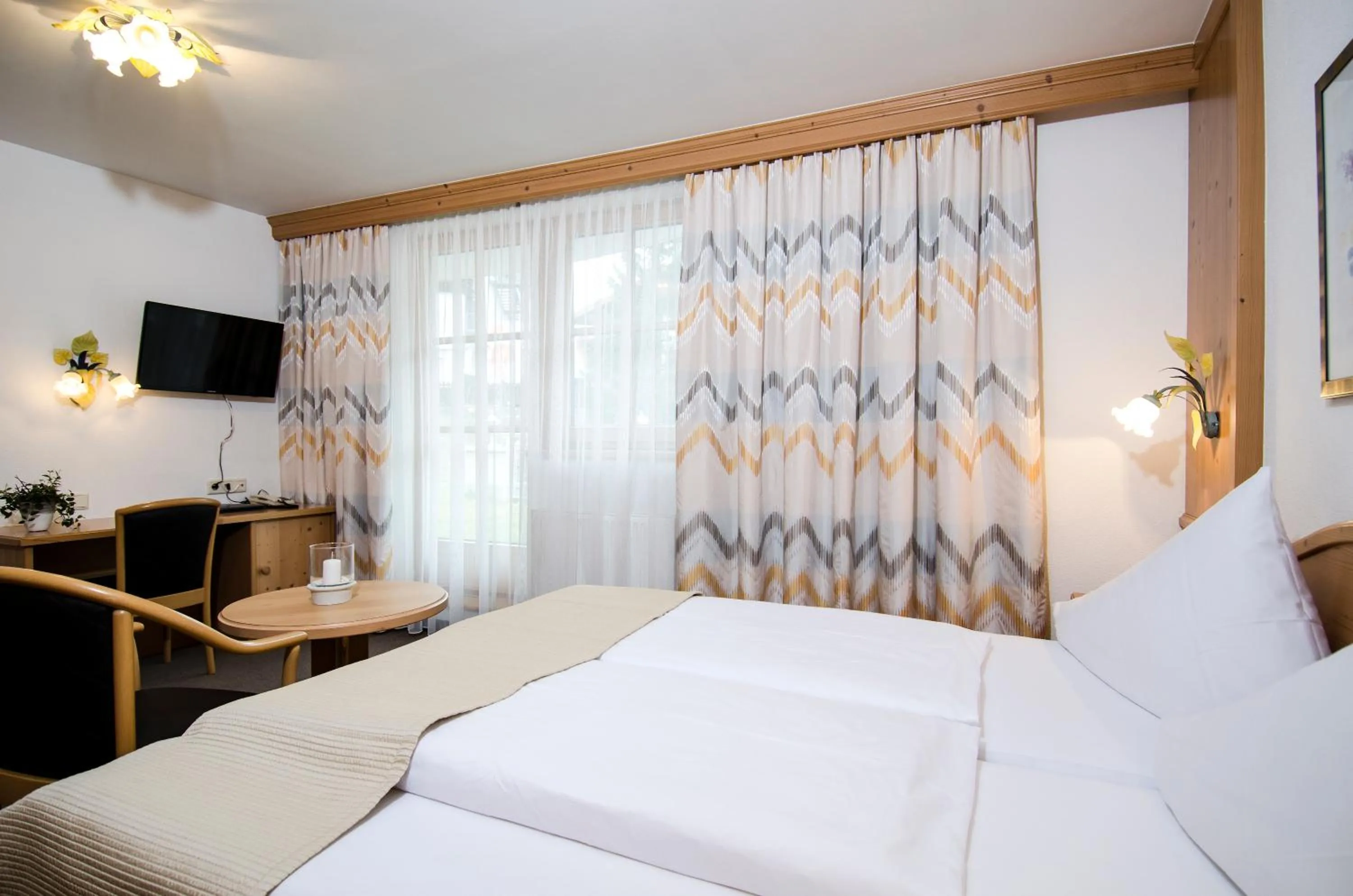 Bed in Hotel Garni Subretta