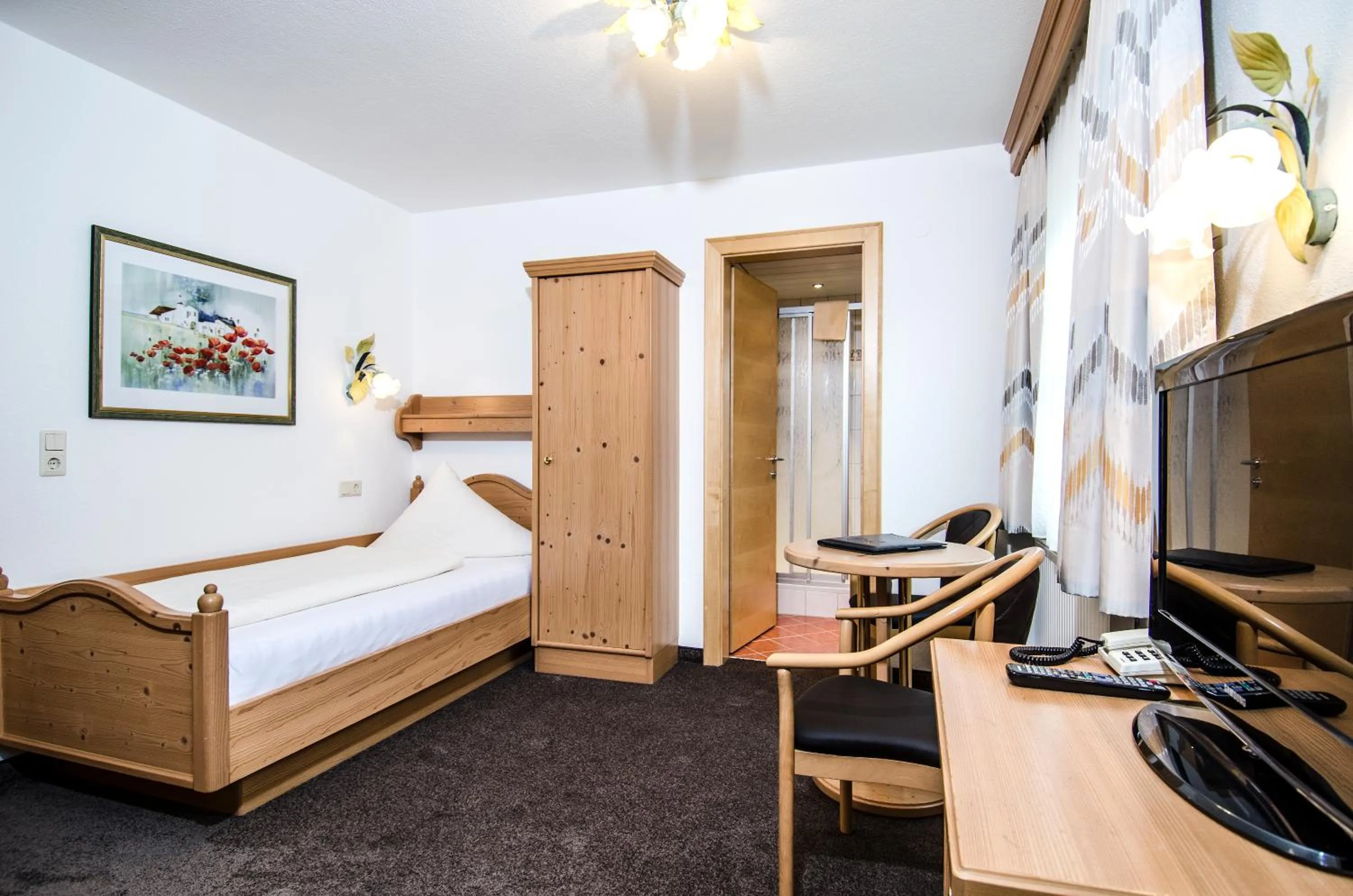 Bed in Hotel Garni Subretta