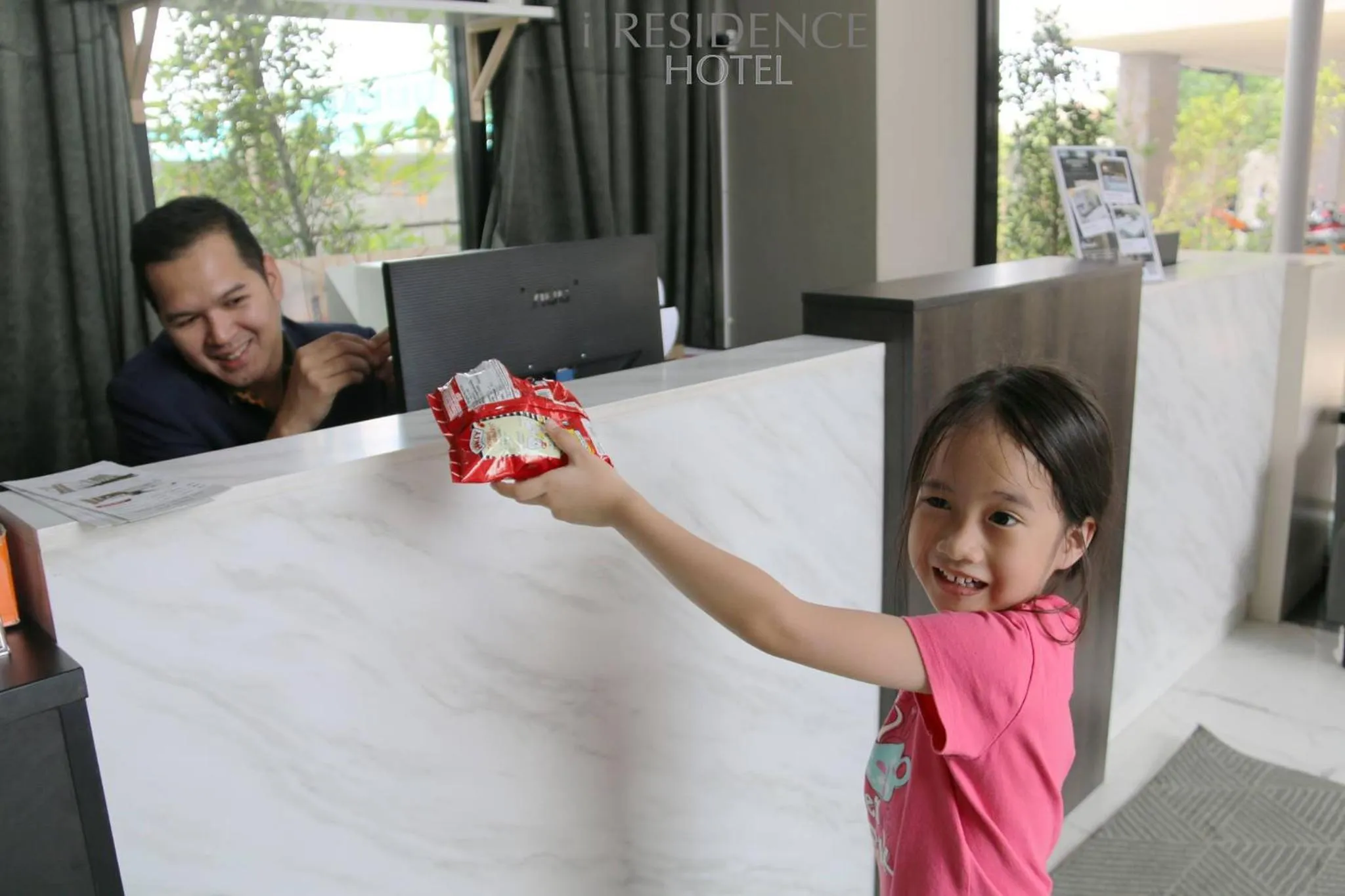 Staff in iResidence hotel