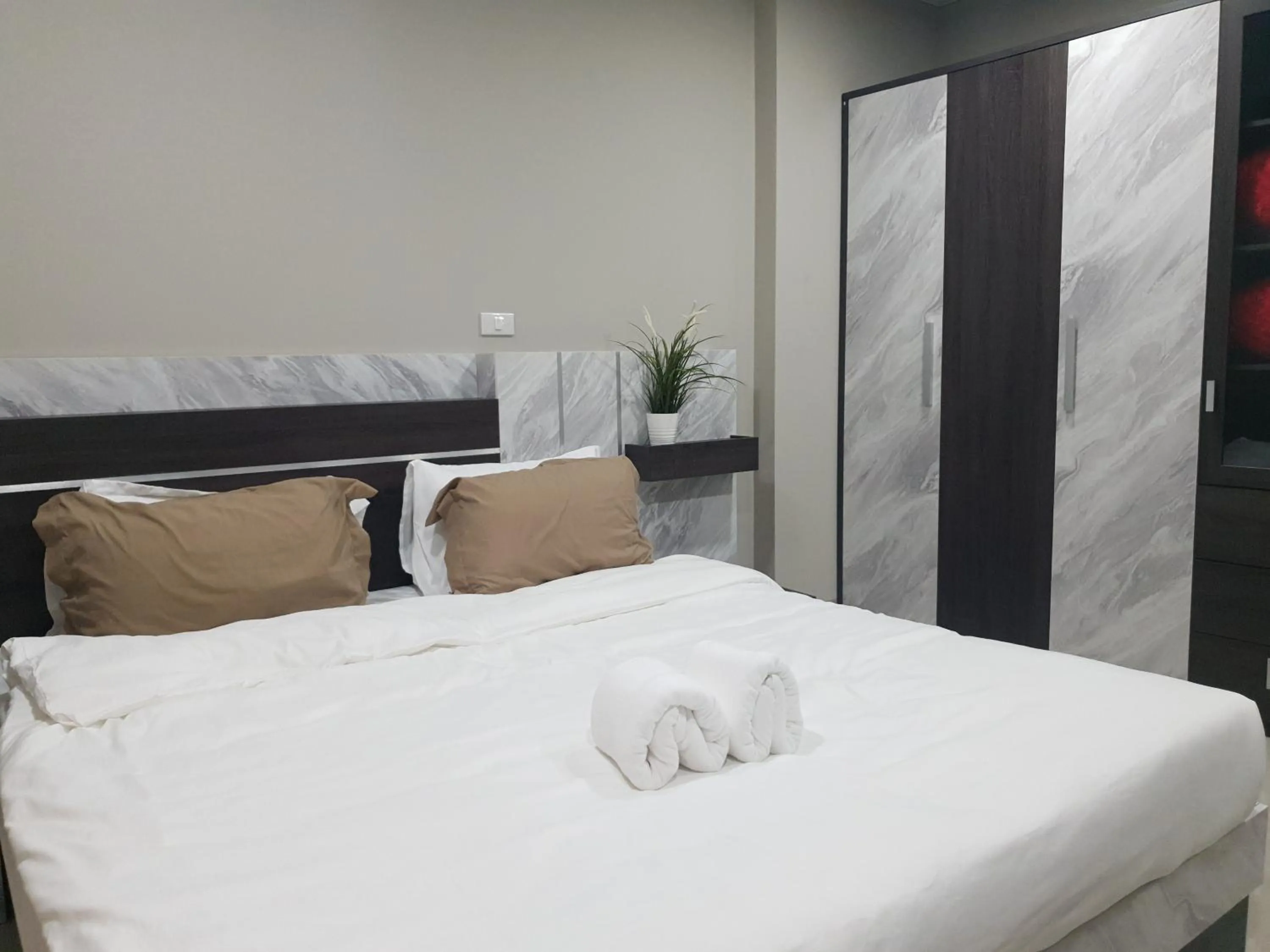 Bed in iResidence hotel