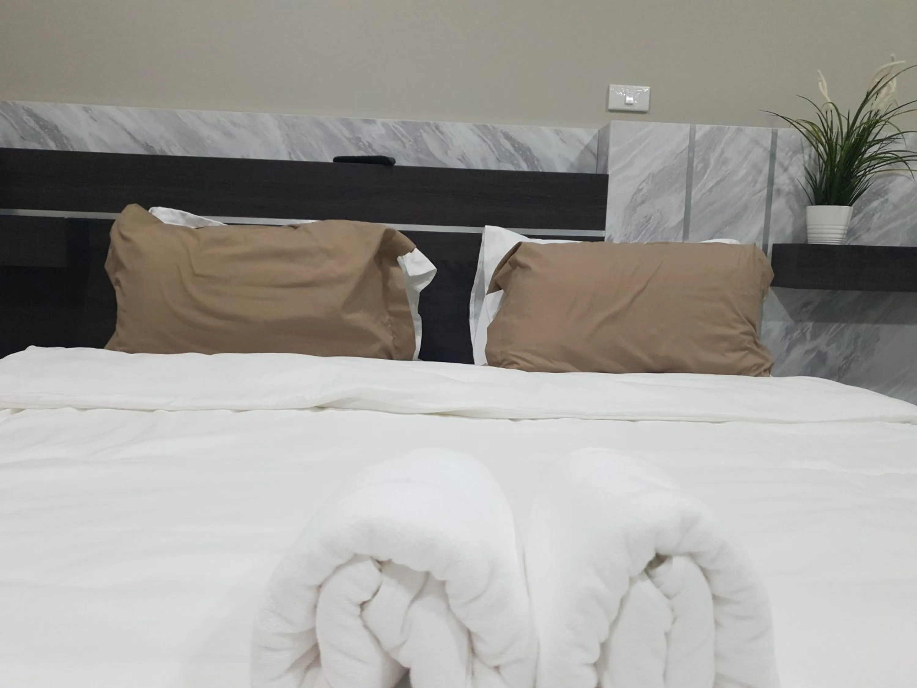 Bed in iResidence hotel