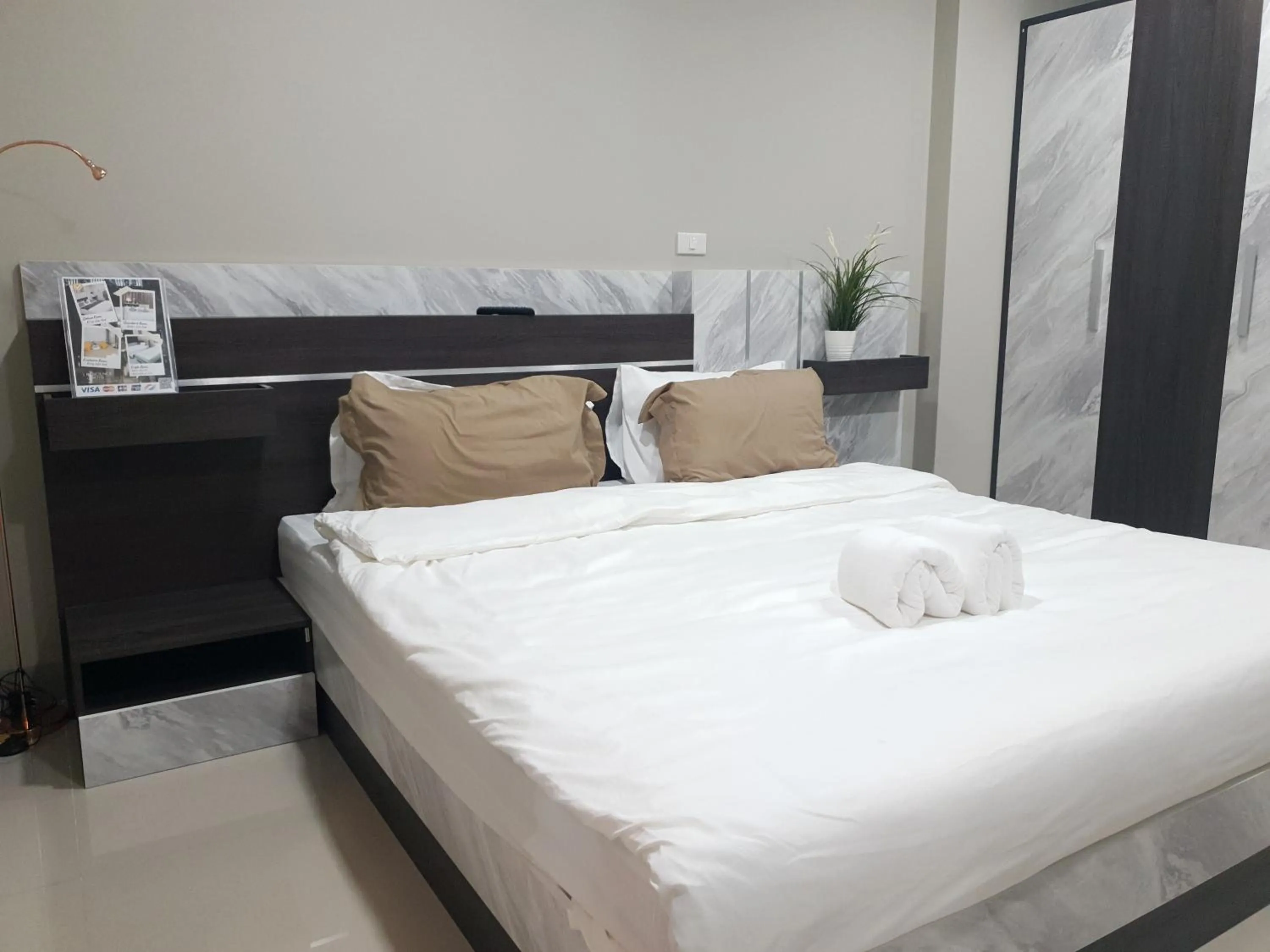 Bed in iResidence hotel