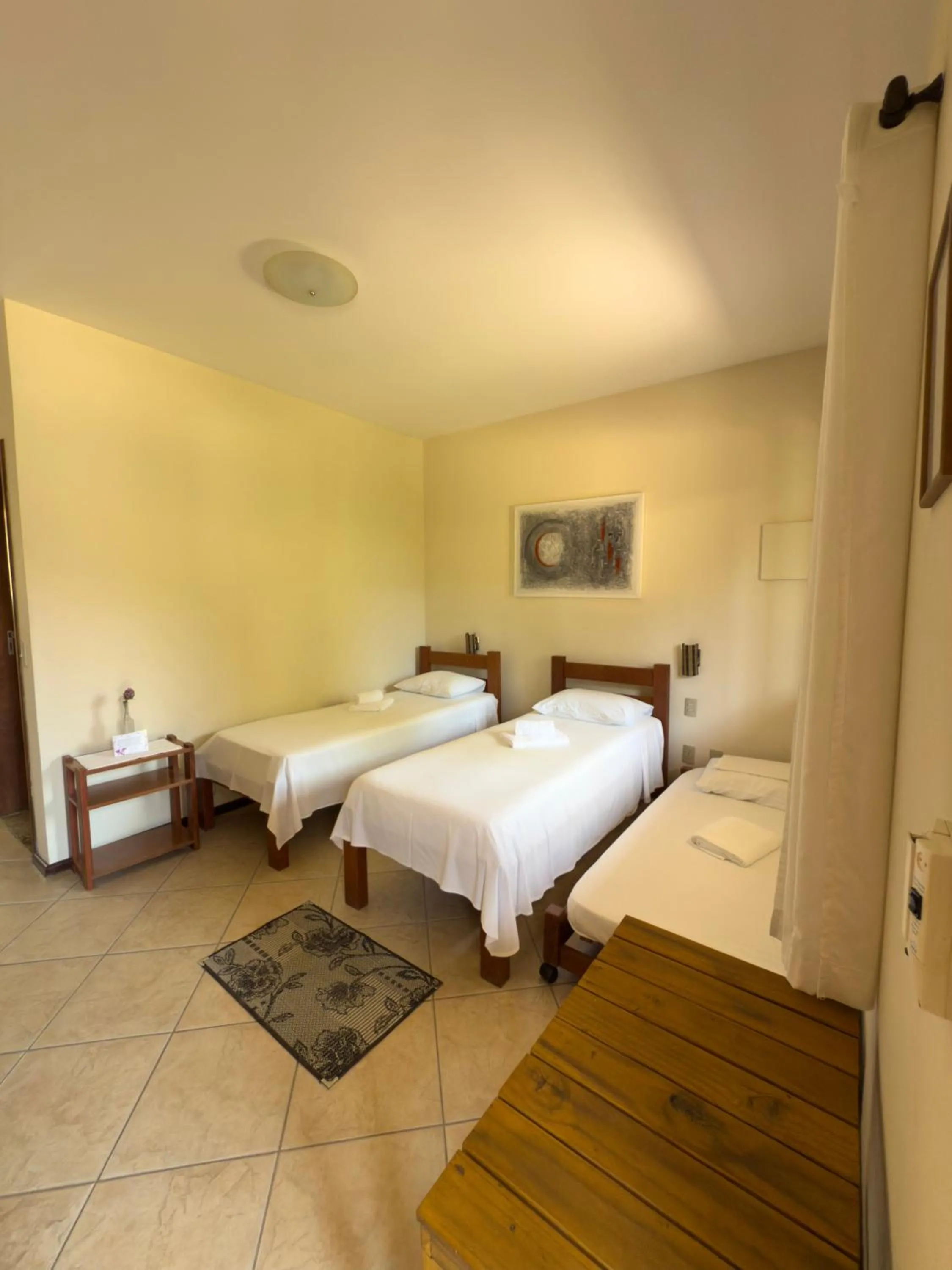 Bed in Pousada Tempo Rei