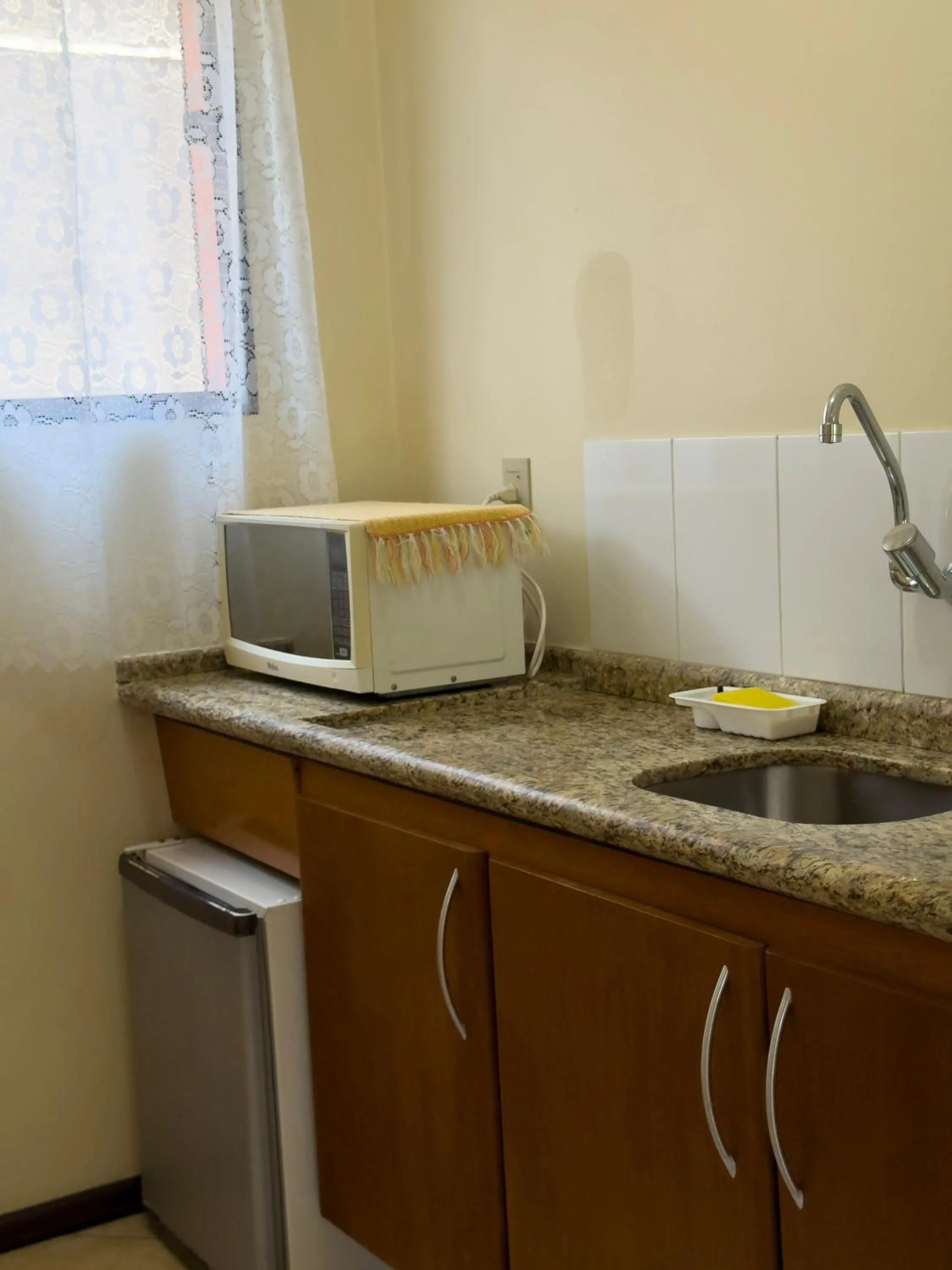 Kitchen or kitchenette in Pousada Tempo Rei