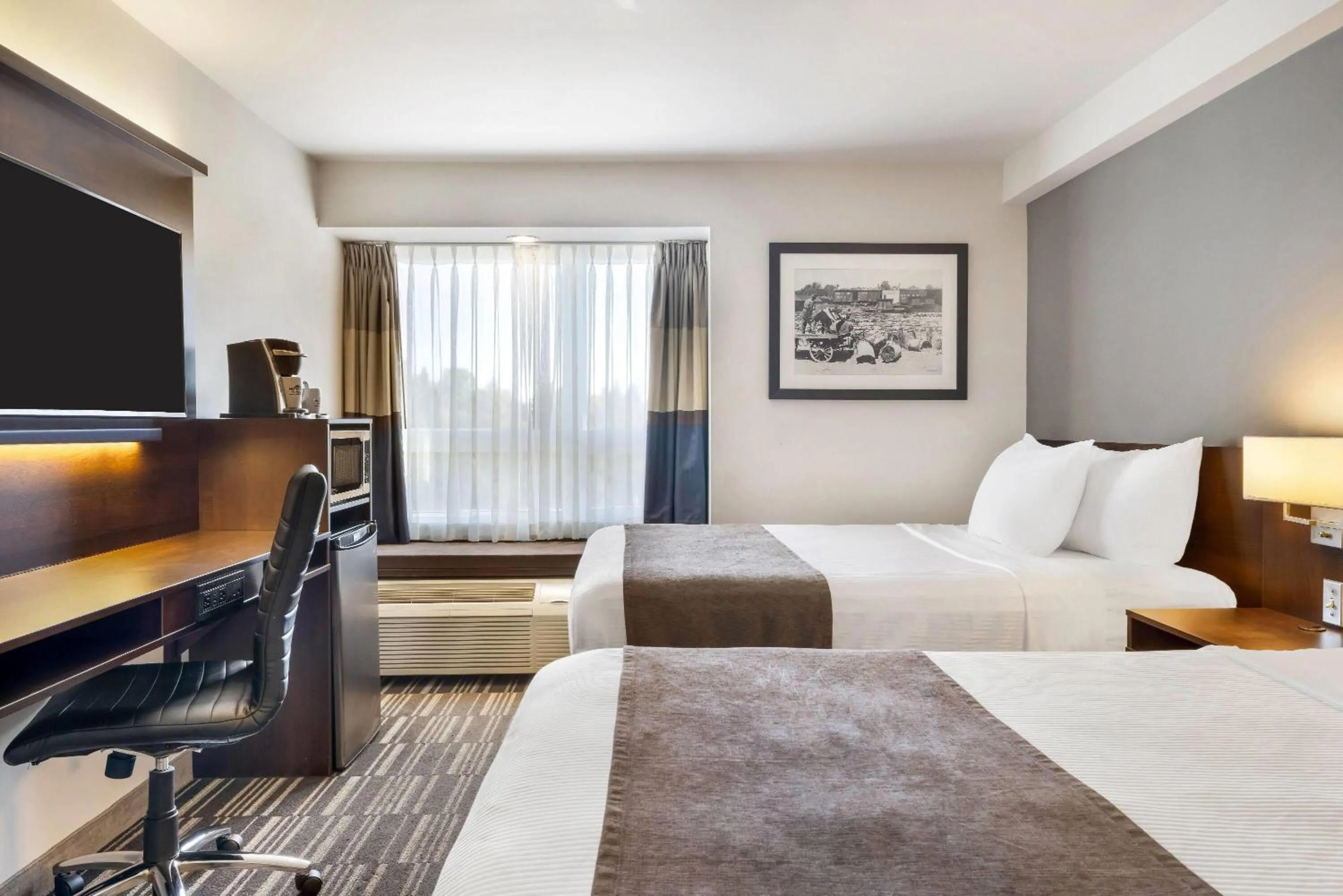Bed in Microtel Inn & Suites by Wyndham Mont Tremblant