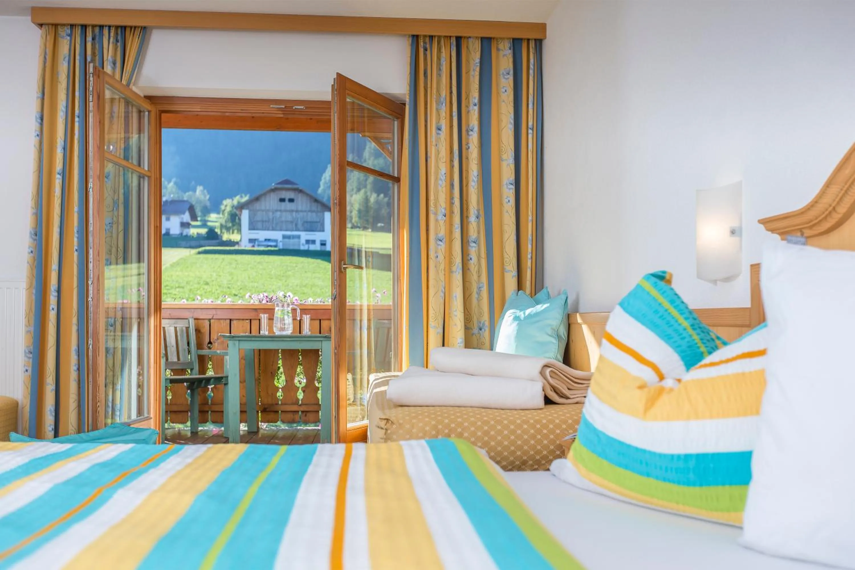 Seating area, Bed in Hotel Lindnerhof