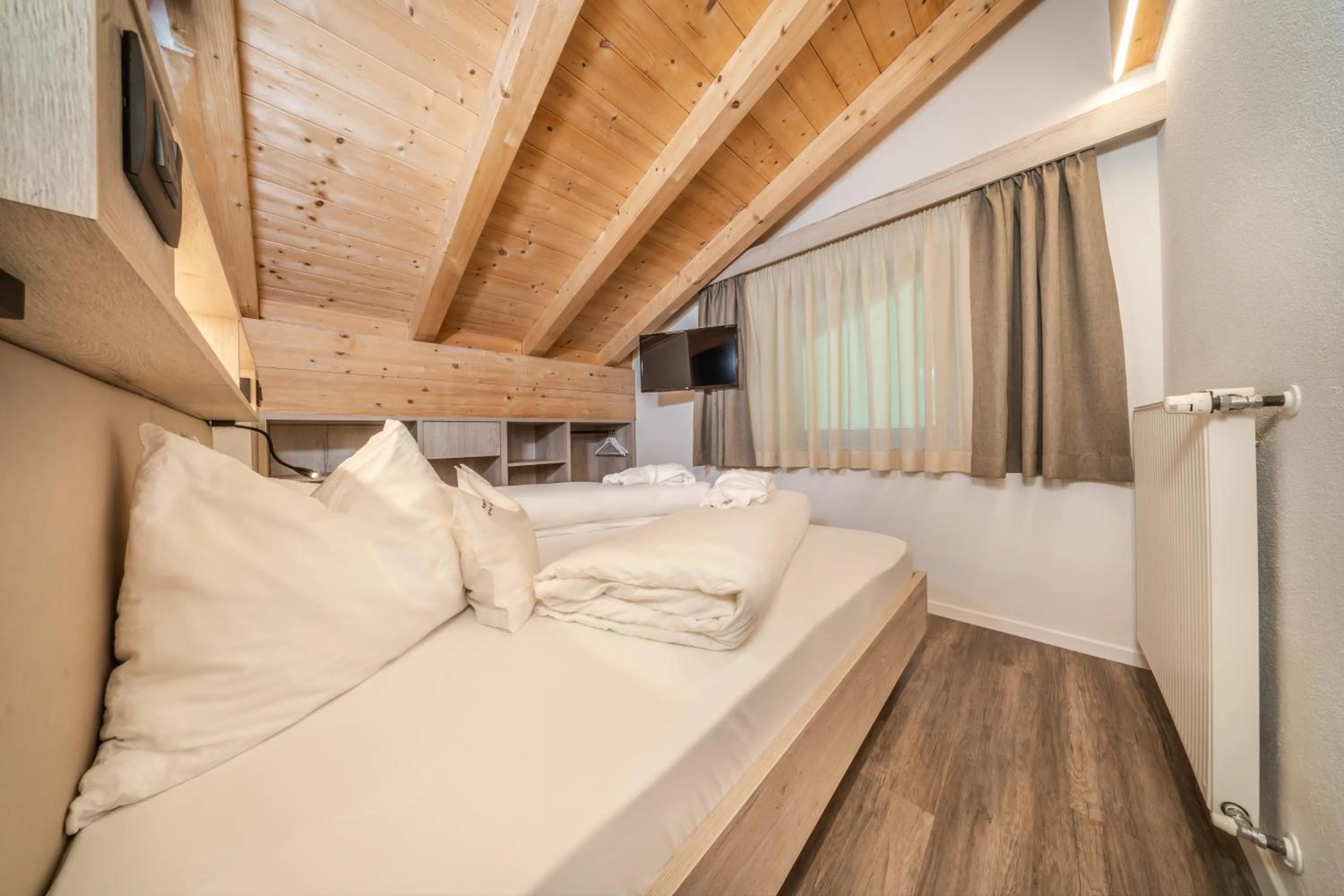 Bed in Apartments & Garnì Pre Da Nai