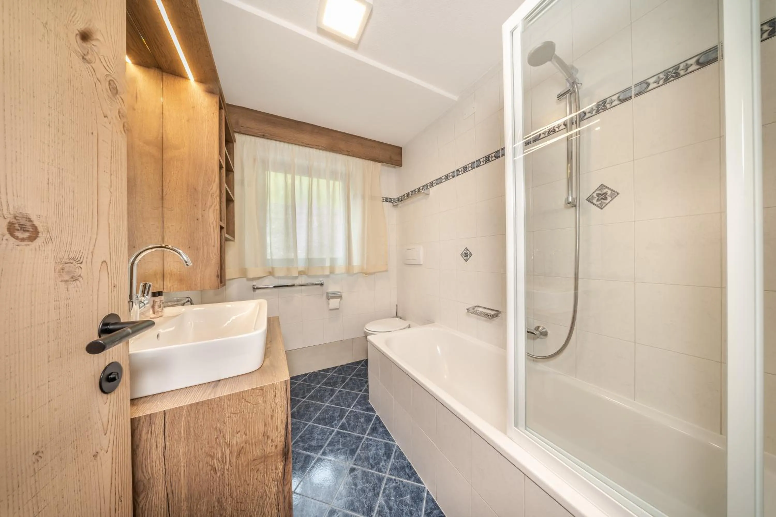 Bathroom in Apartments & Garnì Pre Da Nai