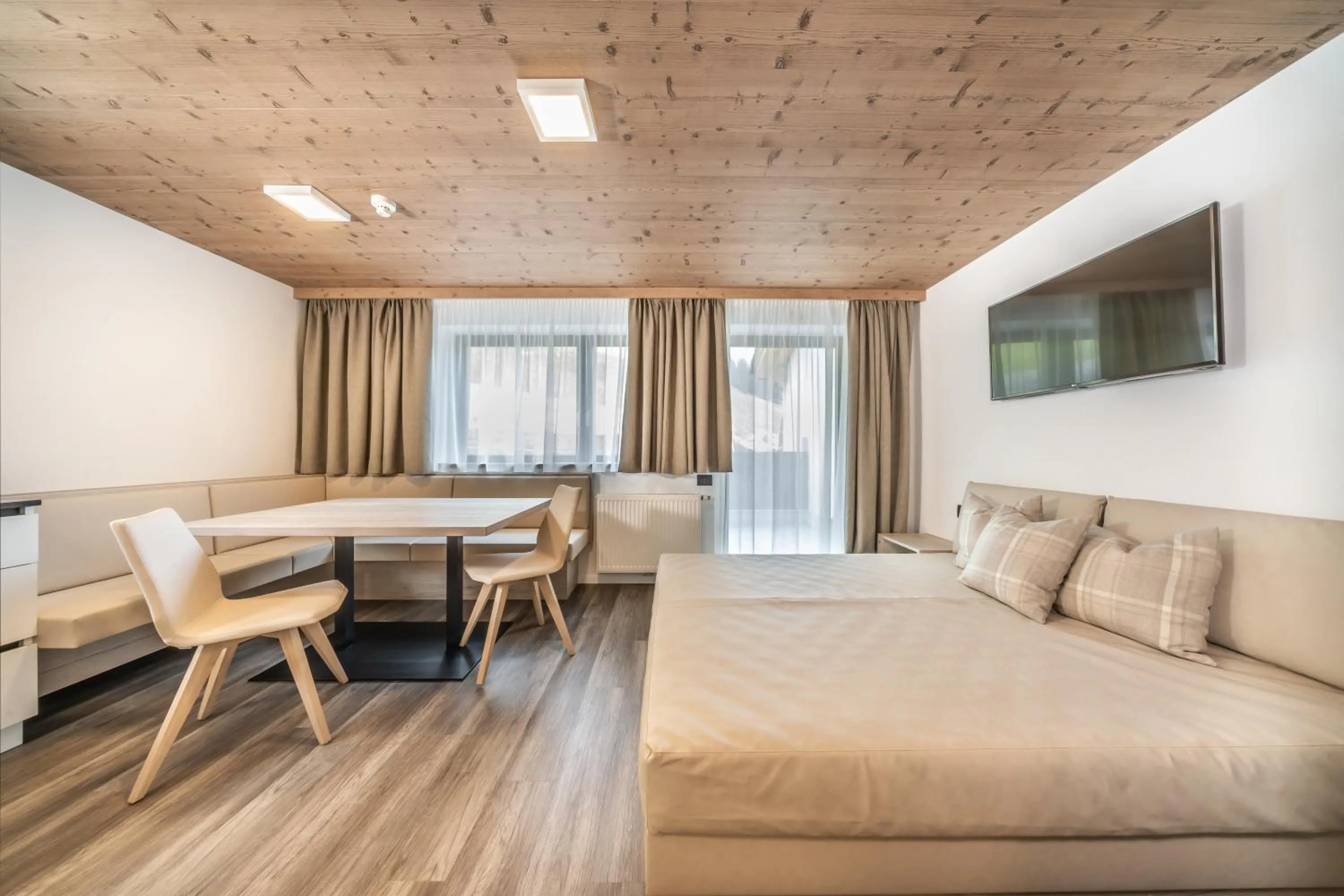 Living room, Bed in Apartments & Garnì Pre Da Nai