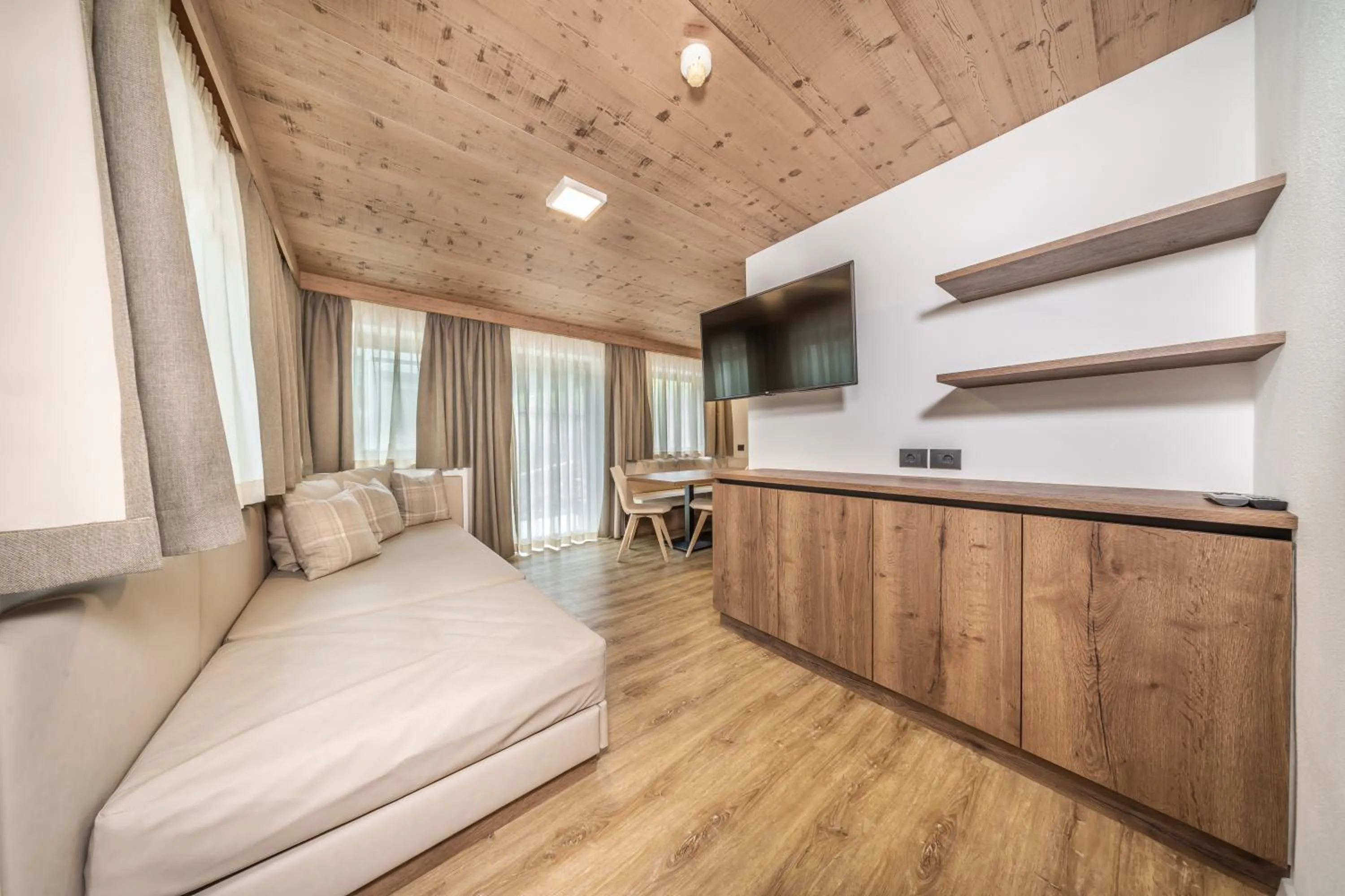 Living room, Bed in Apartments & Garnì Pre Da Nai