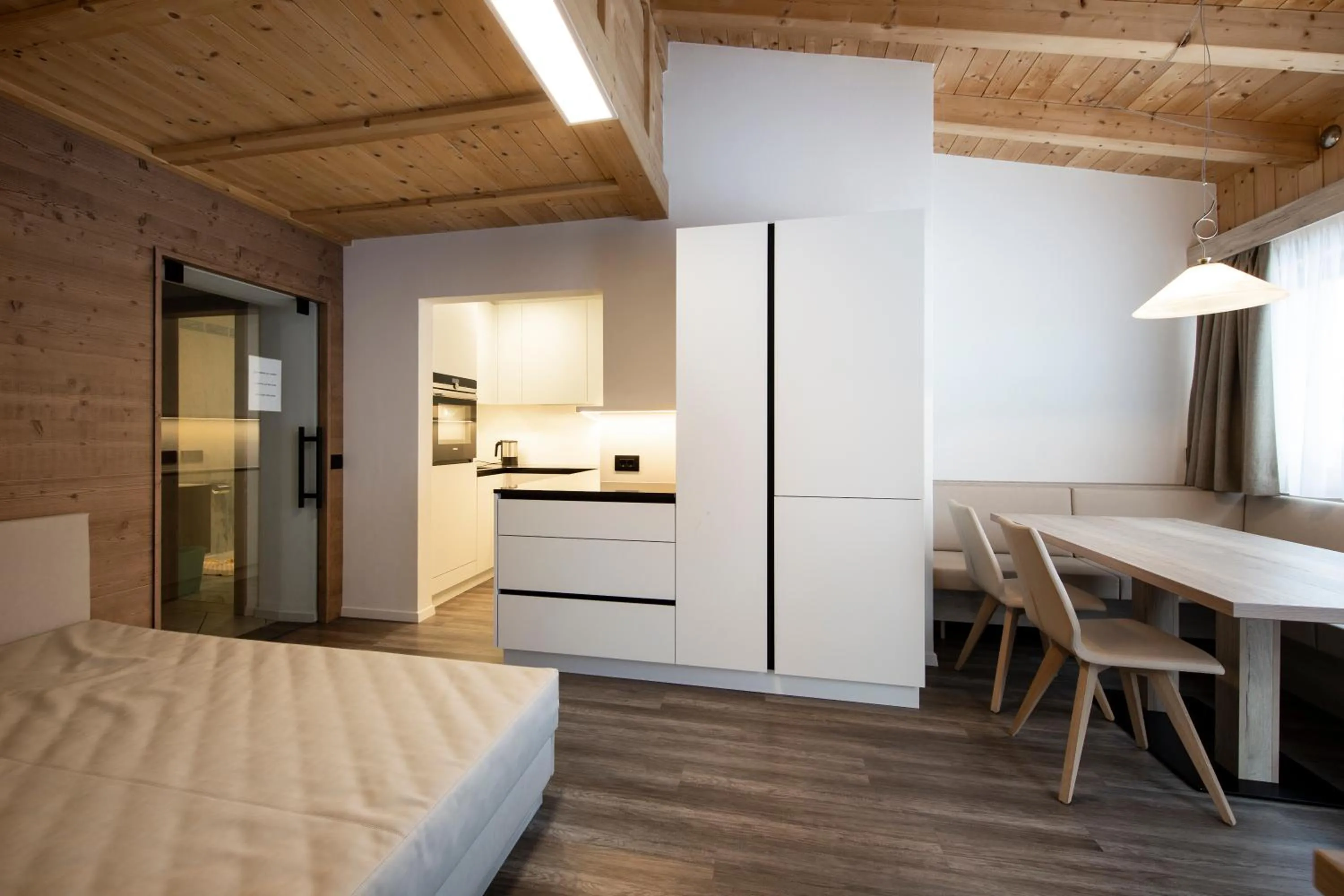 Kitchen or kitchenette, Bed in Apartments & Garnì Pre Da Nai
