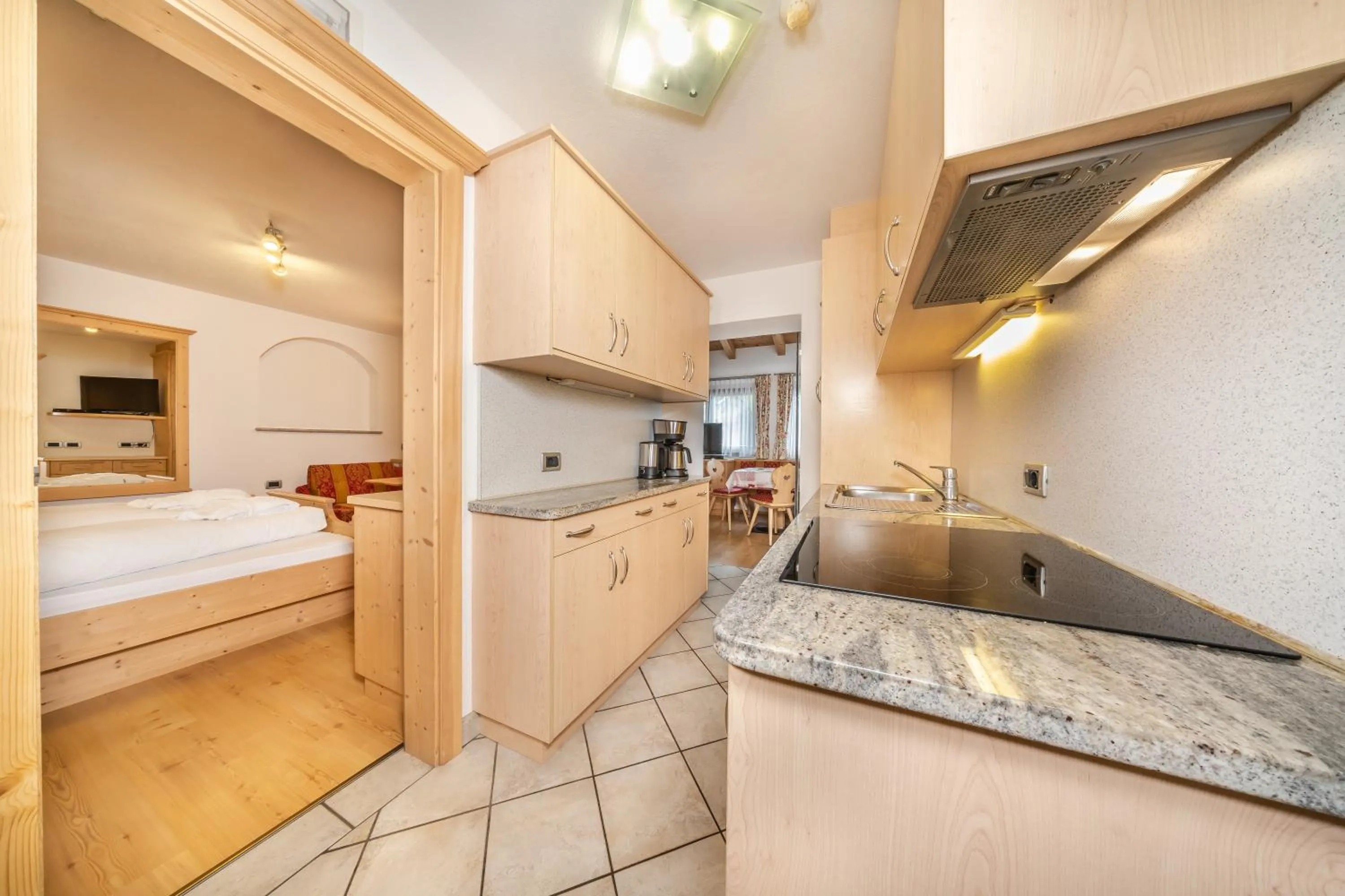 Kitchen or kitchenette in Apartments & Garnì Pre Da Nai