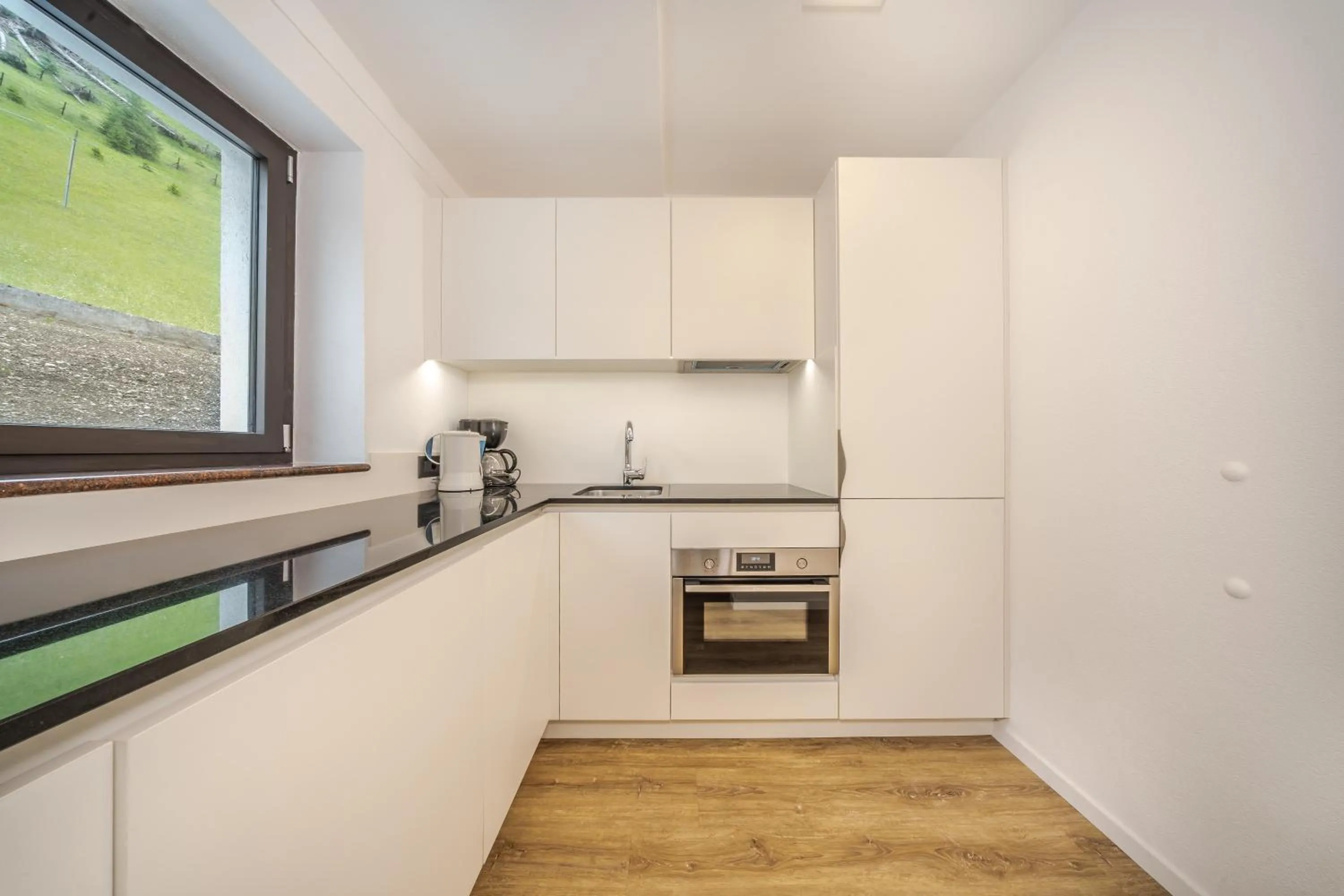 Kitchen or kitchenette in Apartments & Garnì Pre Da Nai