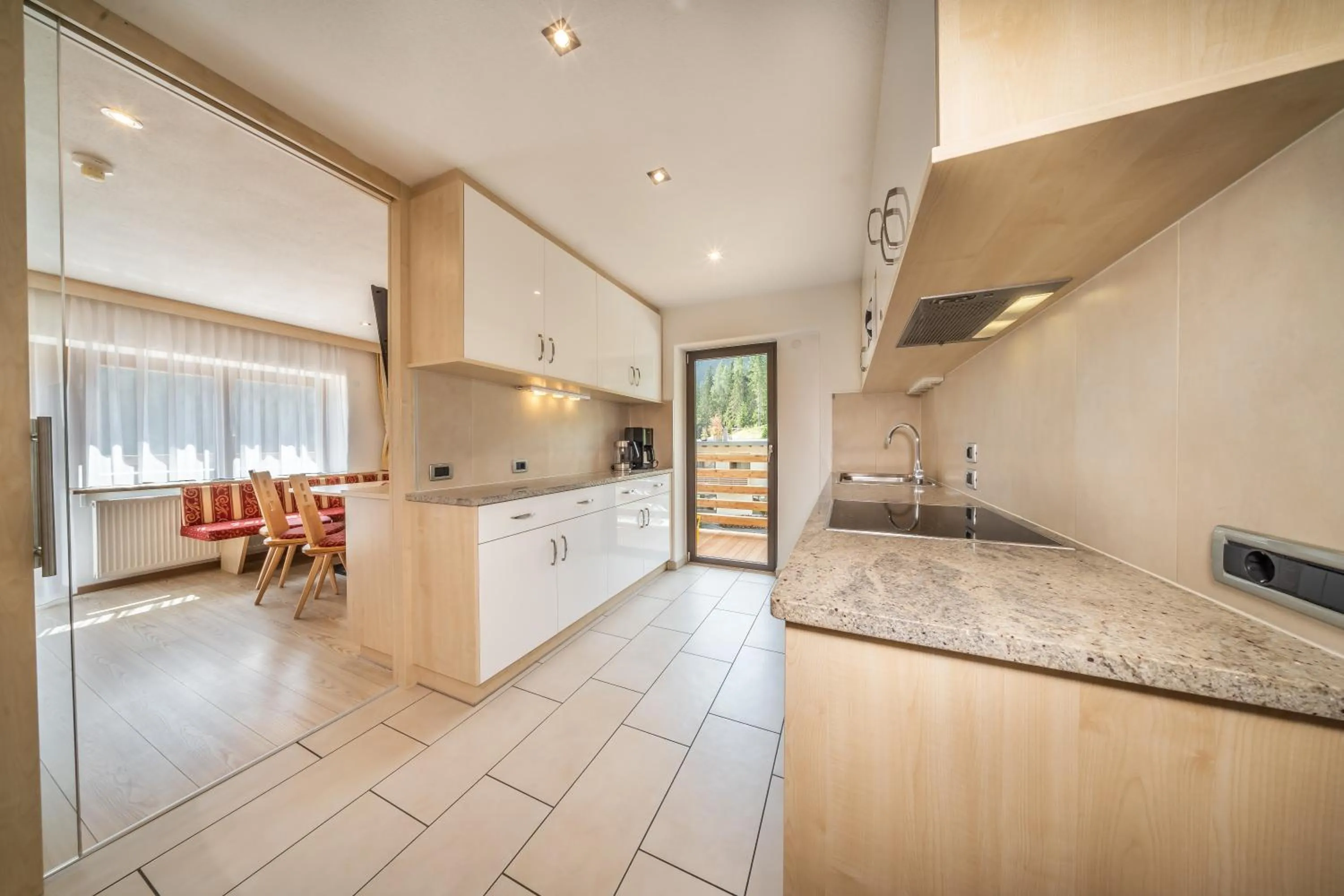 Kitchen or kitchenette in Apartments & Garnì Pre Da Nai