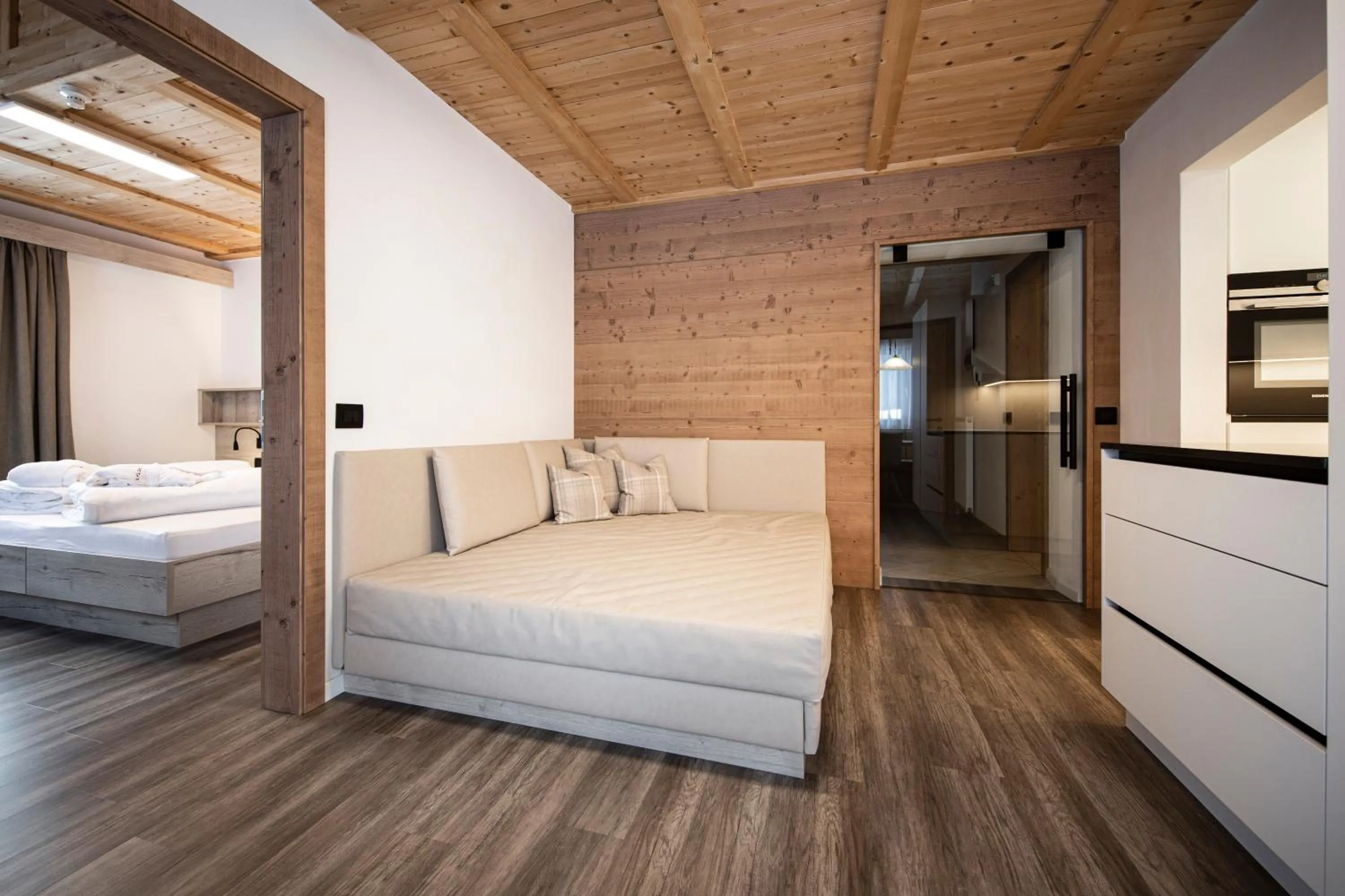 Living room, Bed in Apartments & Garnì Pre Da Nai