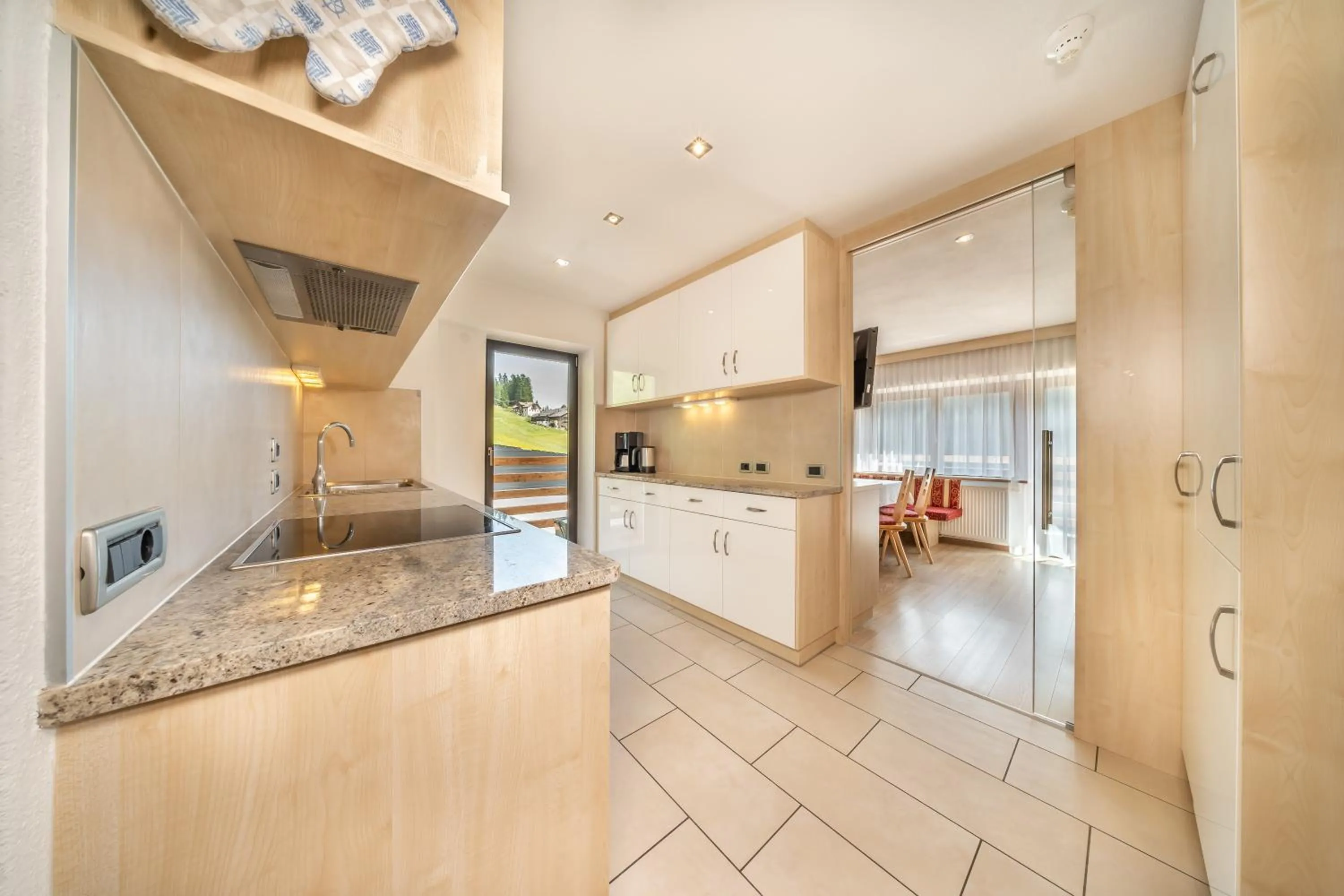 Kitchen or kitchenette in Apartments & Garnì Pre Da Nai