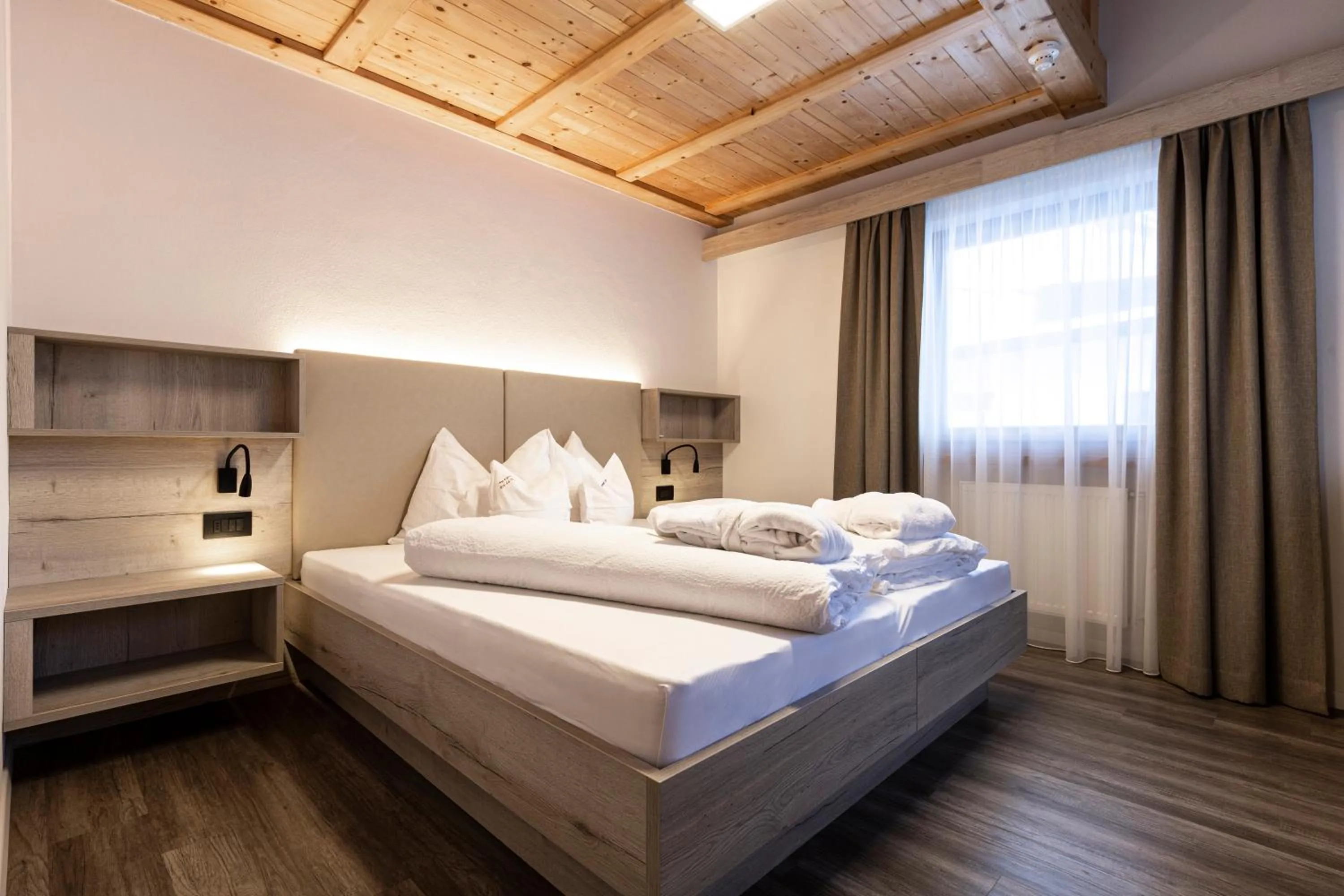Bed in Apartments & Garnì Pre Da Nai