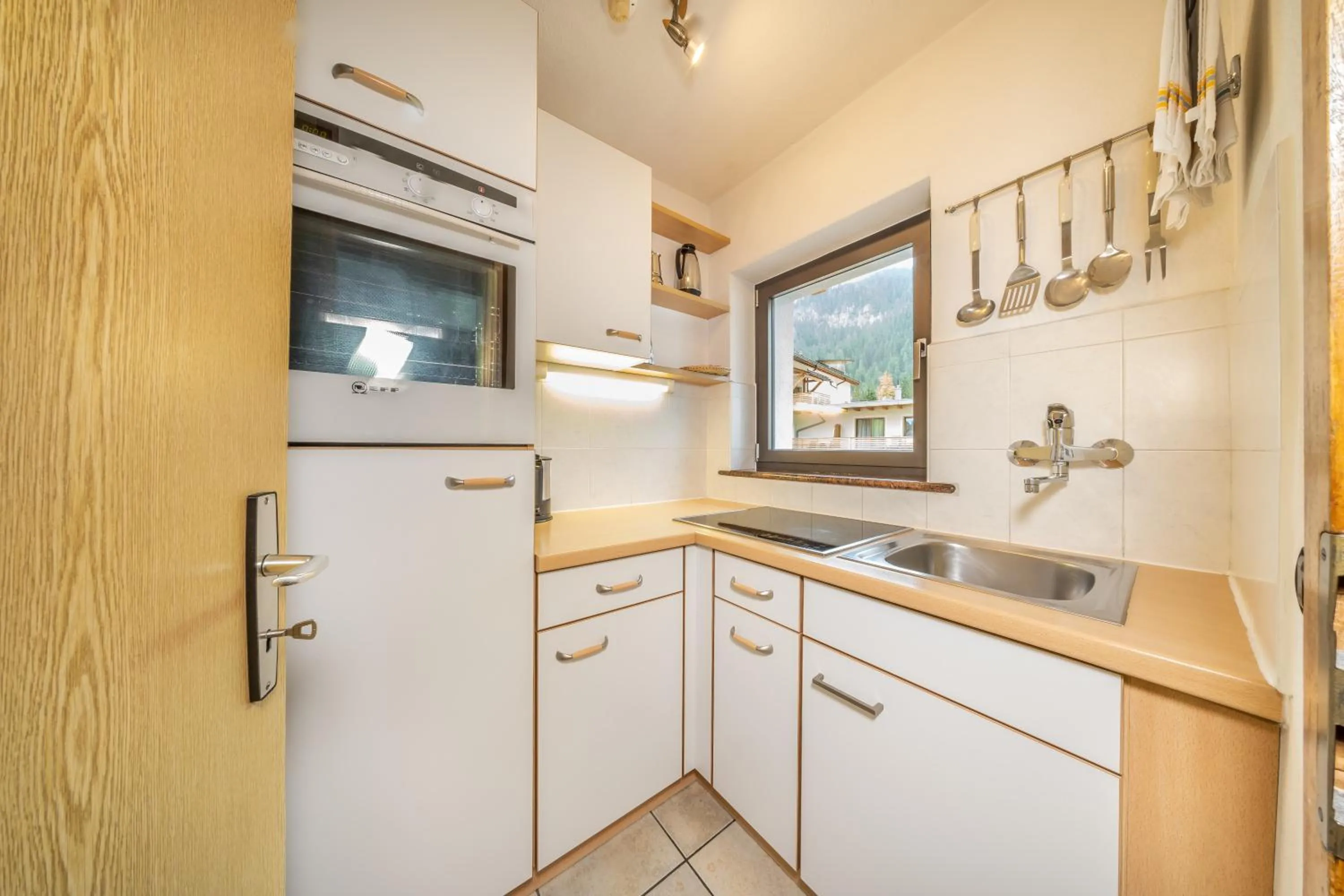 Kitchen or kitchenette in Apartments & Garnì Pre Da Nai