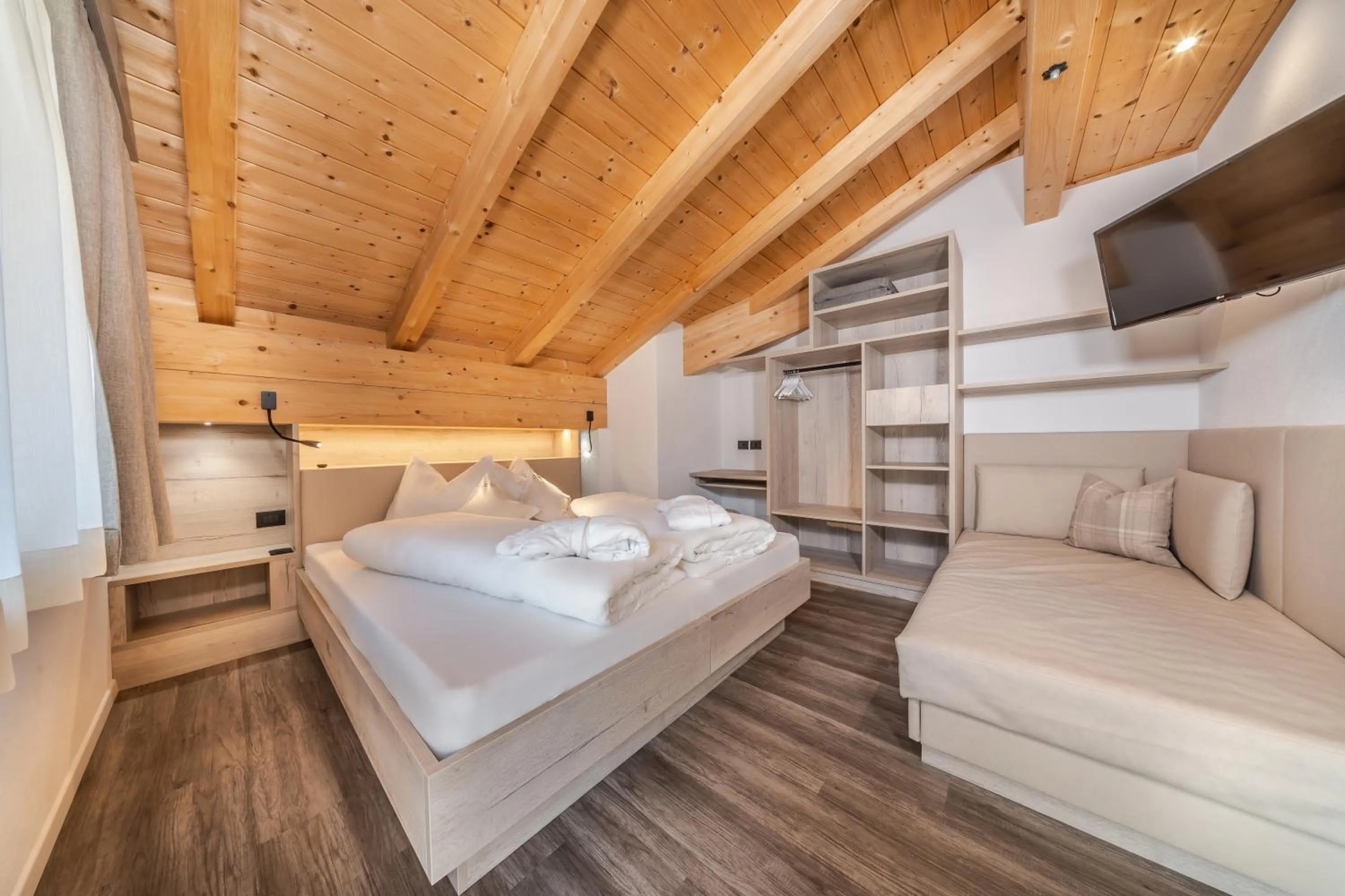 Bed in Apartments & Garnì Pre Da Nai