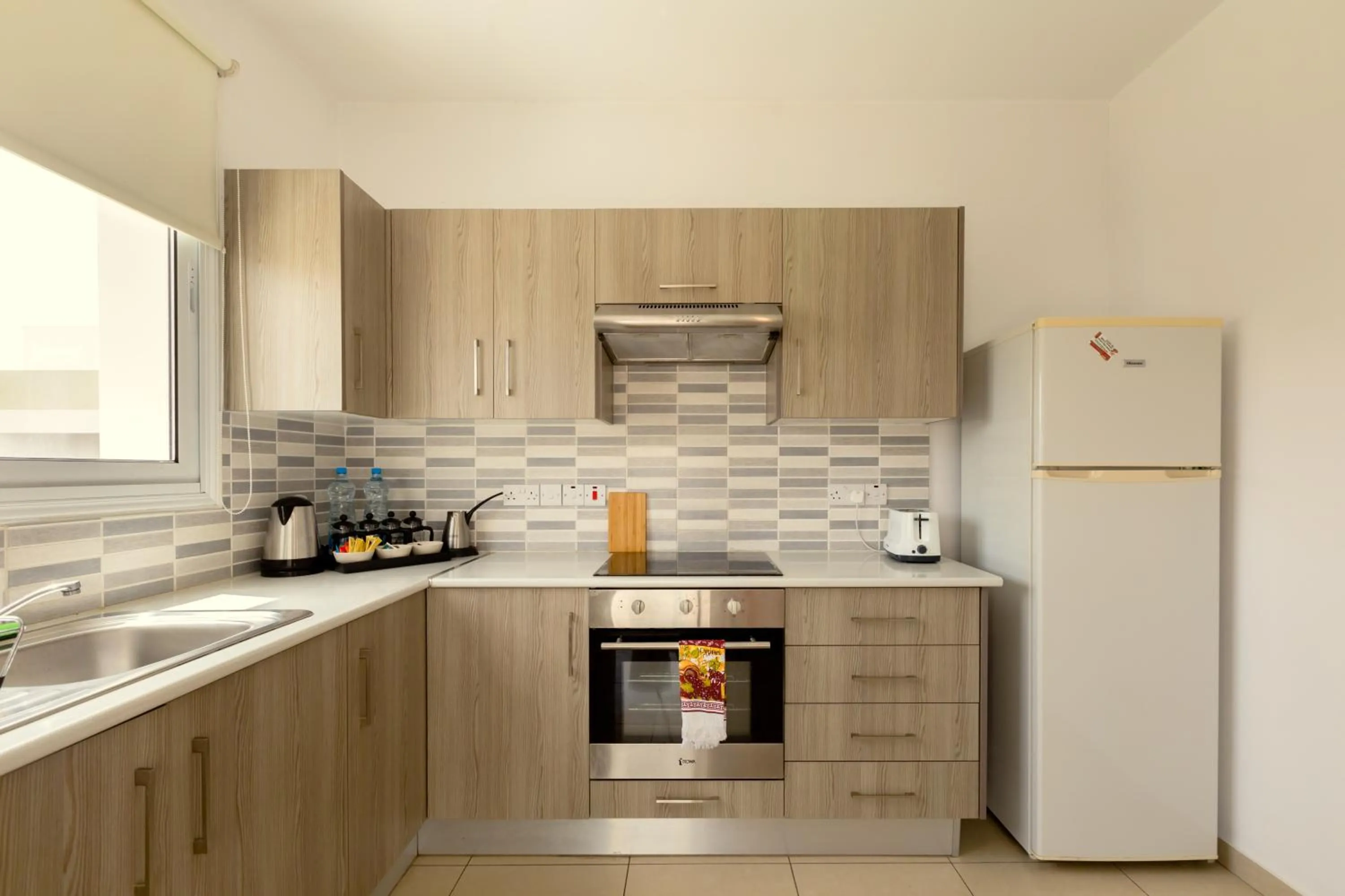 Kitchen or kitchenette in Oceania Bay Village