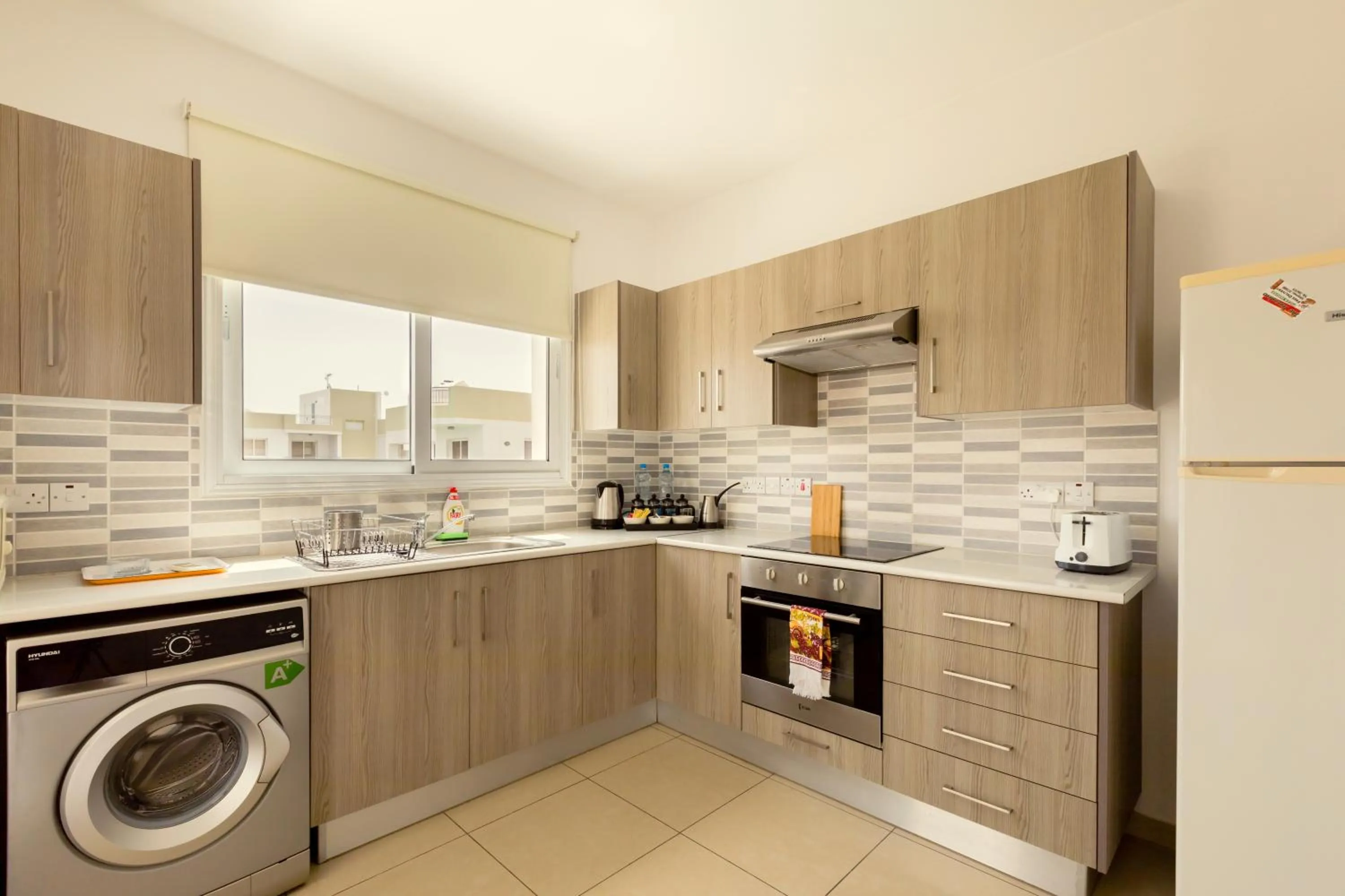 Kitchen or kitchenette in Oceania Bay Village