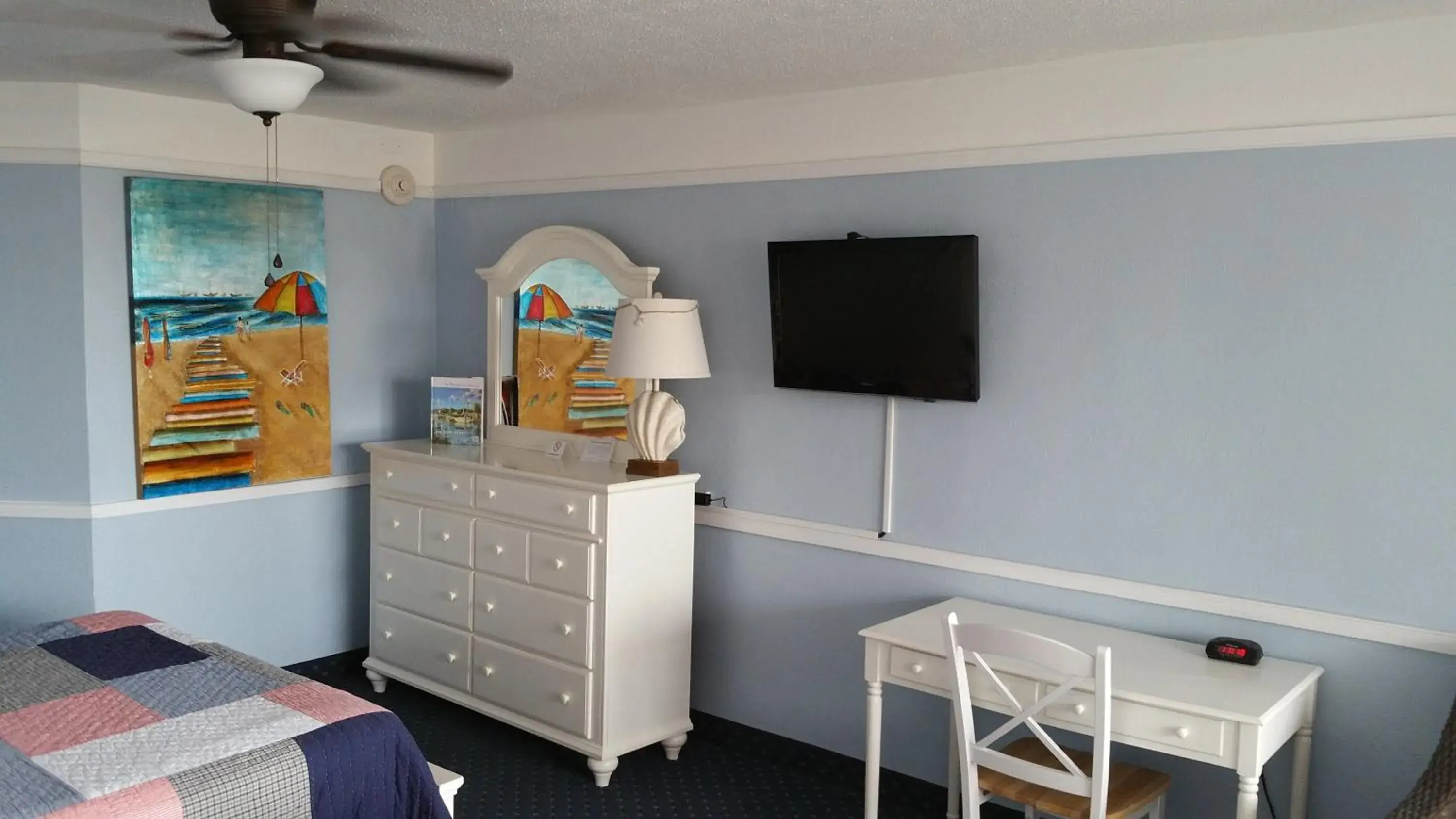 Decorative detail, TV/Entertainment Center in Coral Sands Inn