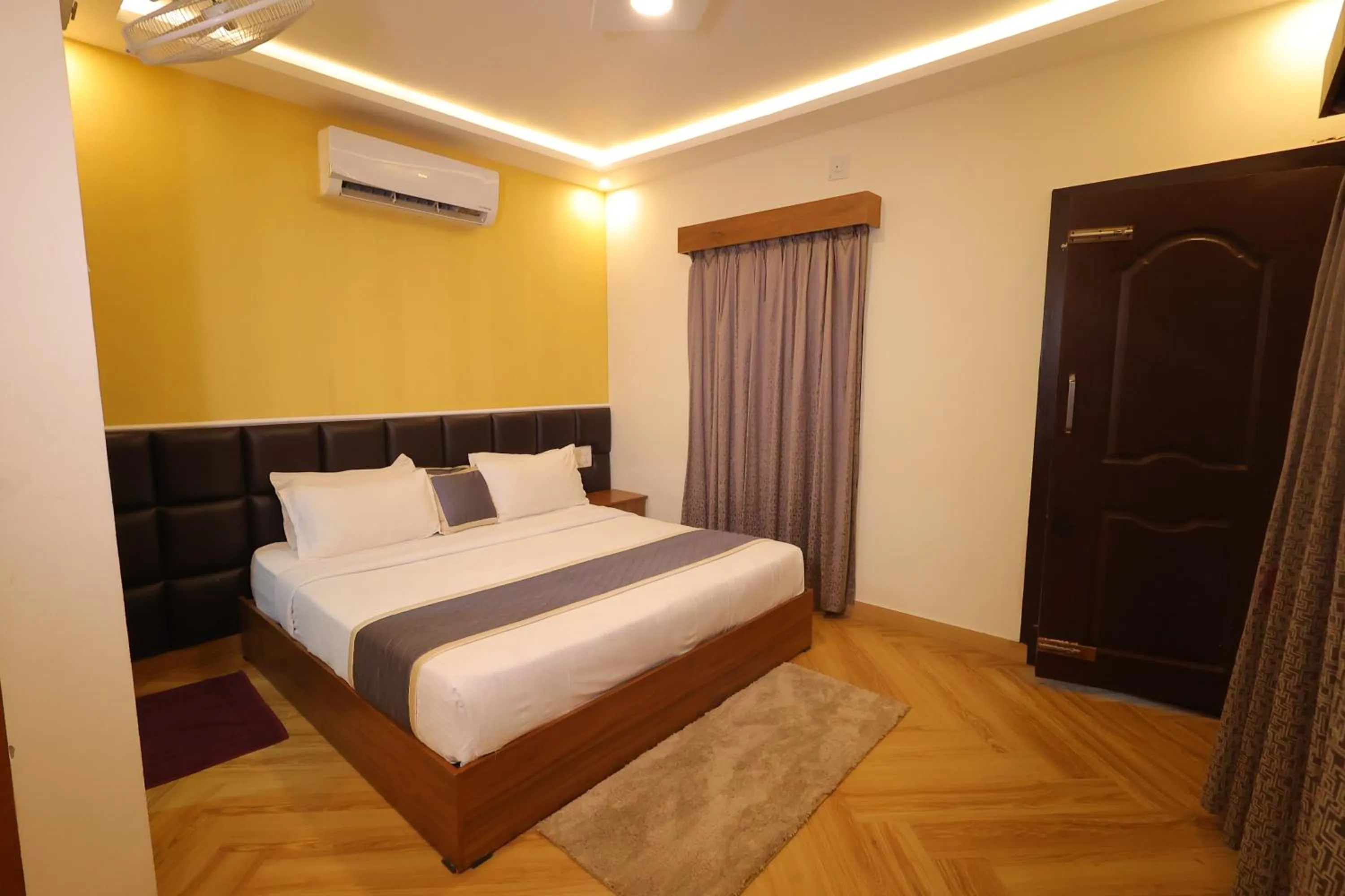 Bed in Le Eden Premium Wayanad Pool Resort