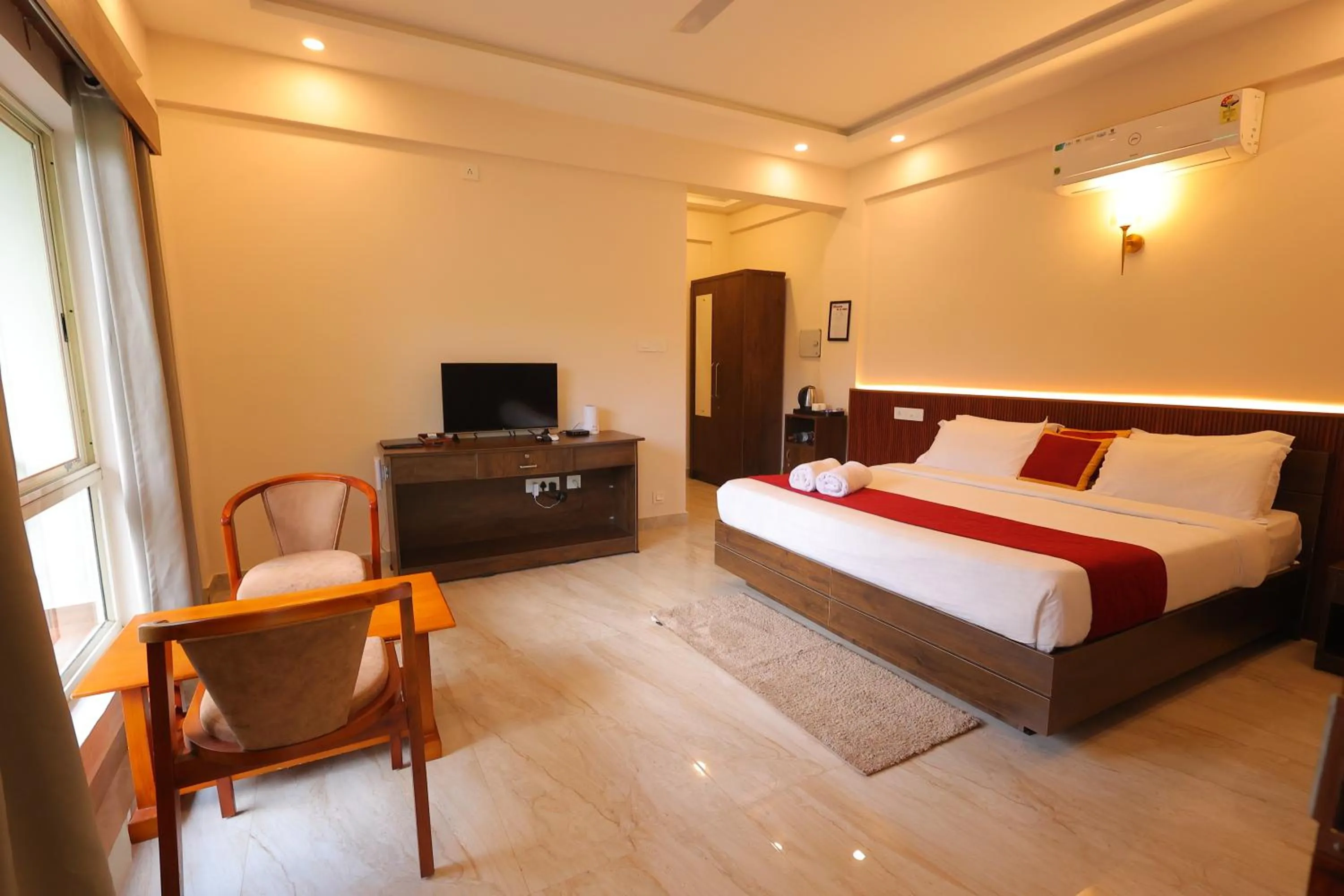 Bed in Le Eden Premium Wayanad Pool Resort