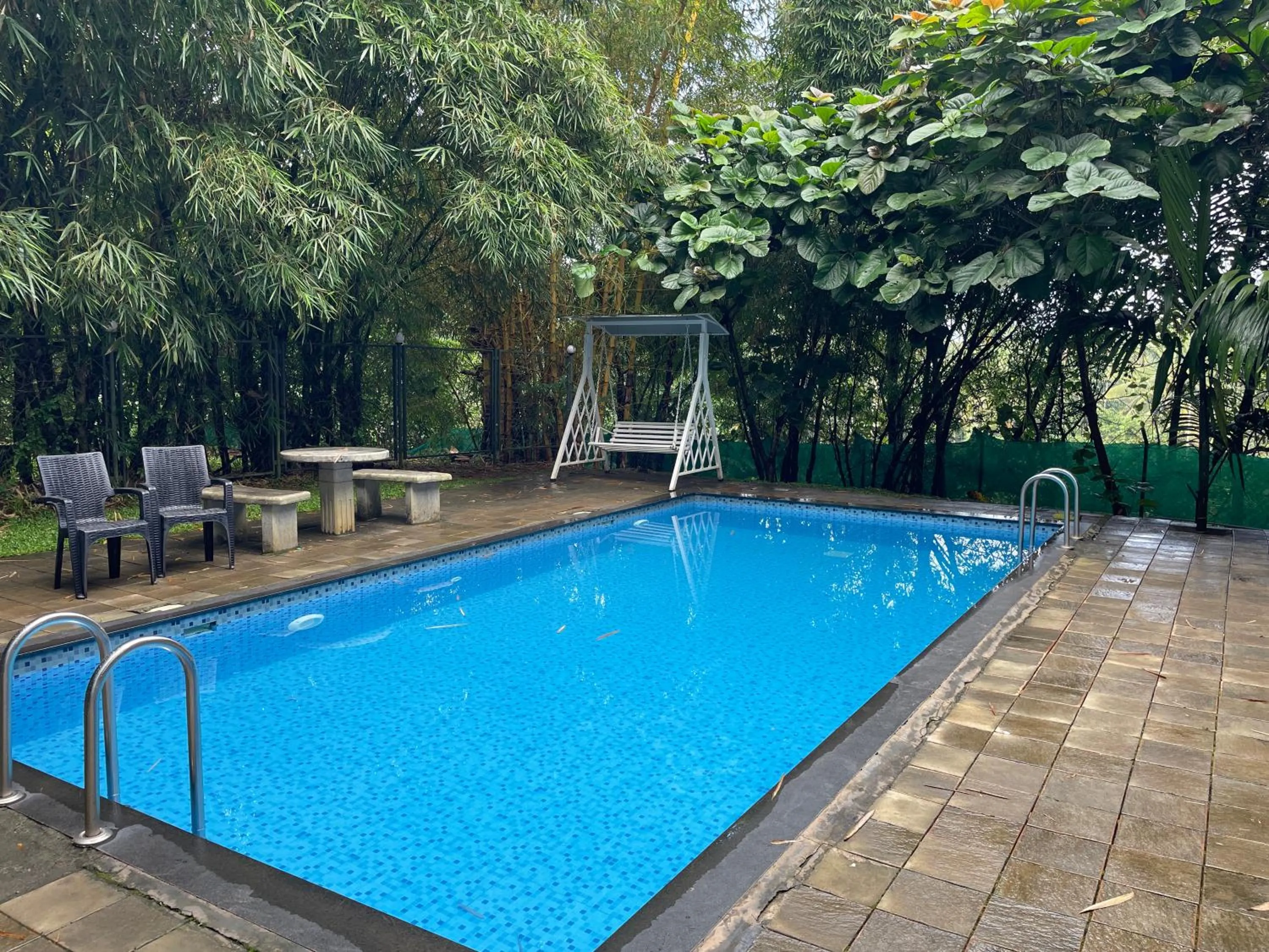 Swimming pool in Le Eden Premium Wayanad Pool Resort