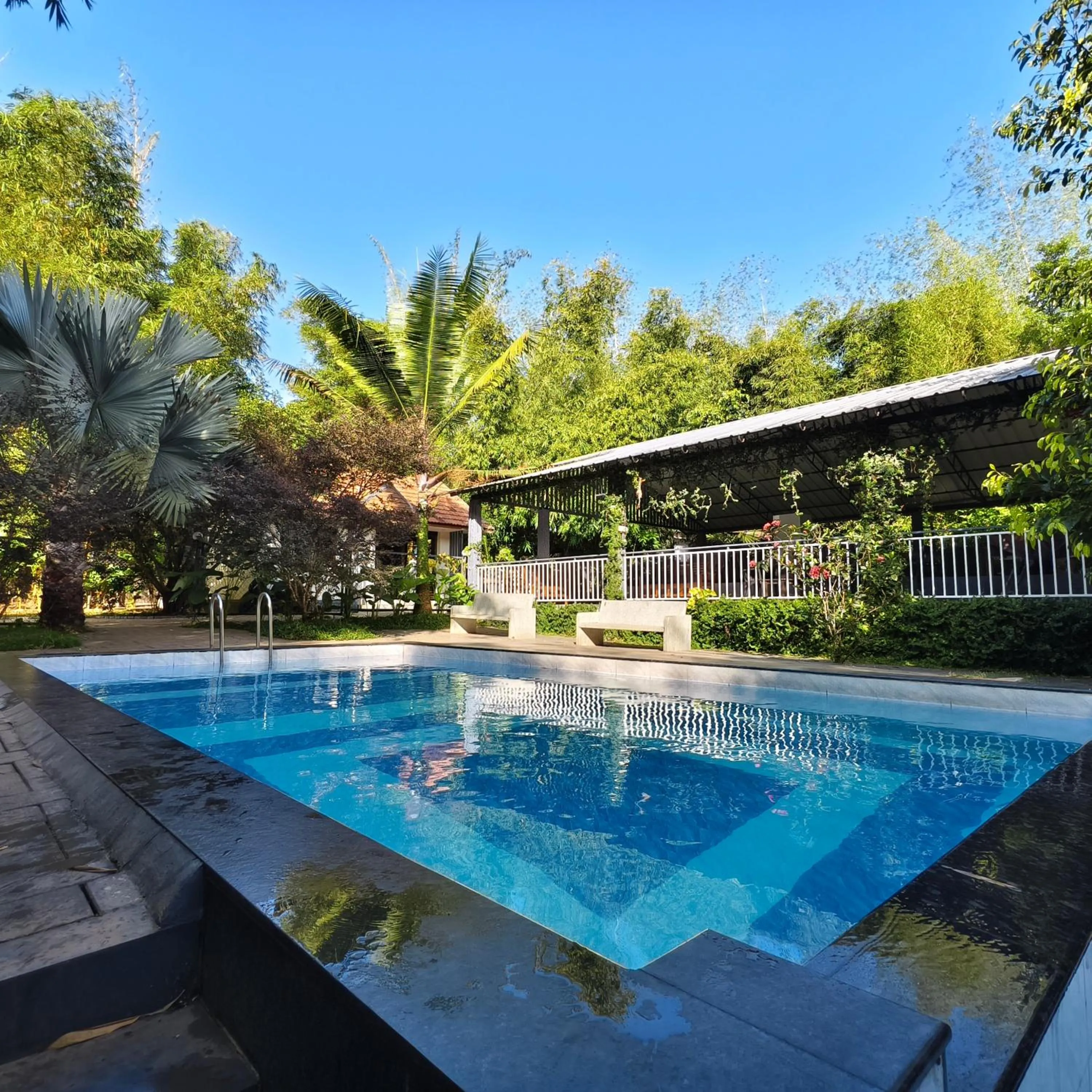 Swimming pool in Le Eden Premium Wayanad Pool Resort