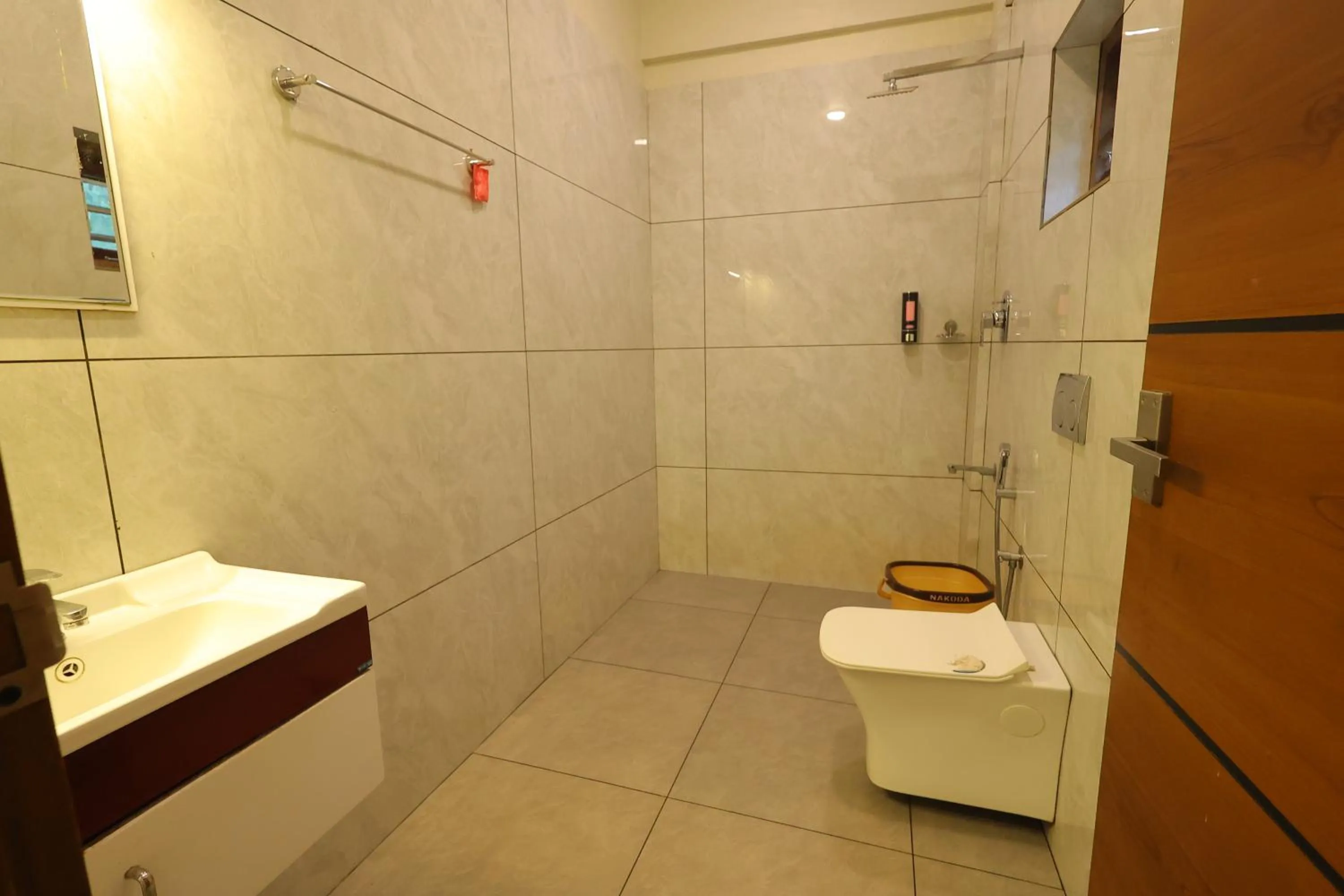 Shower in Le Eden Premium Wayanad Pool Resort