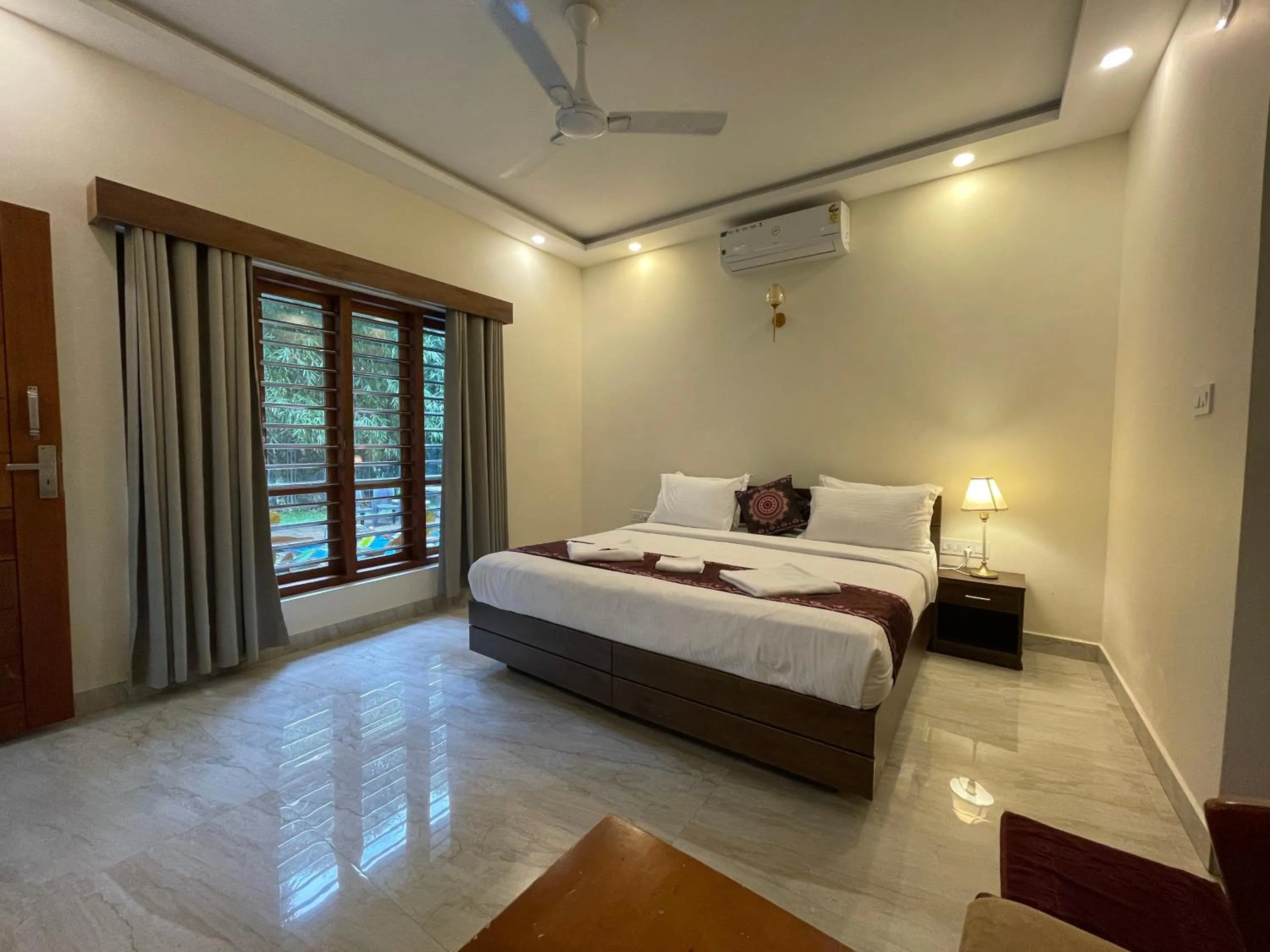 Photo of the whole room, Bed in Le Eden Premium Wayanad Pool Resort