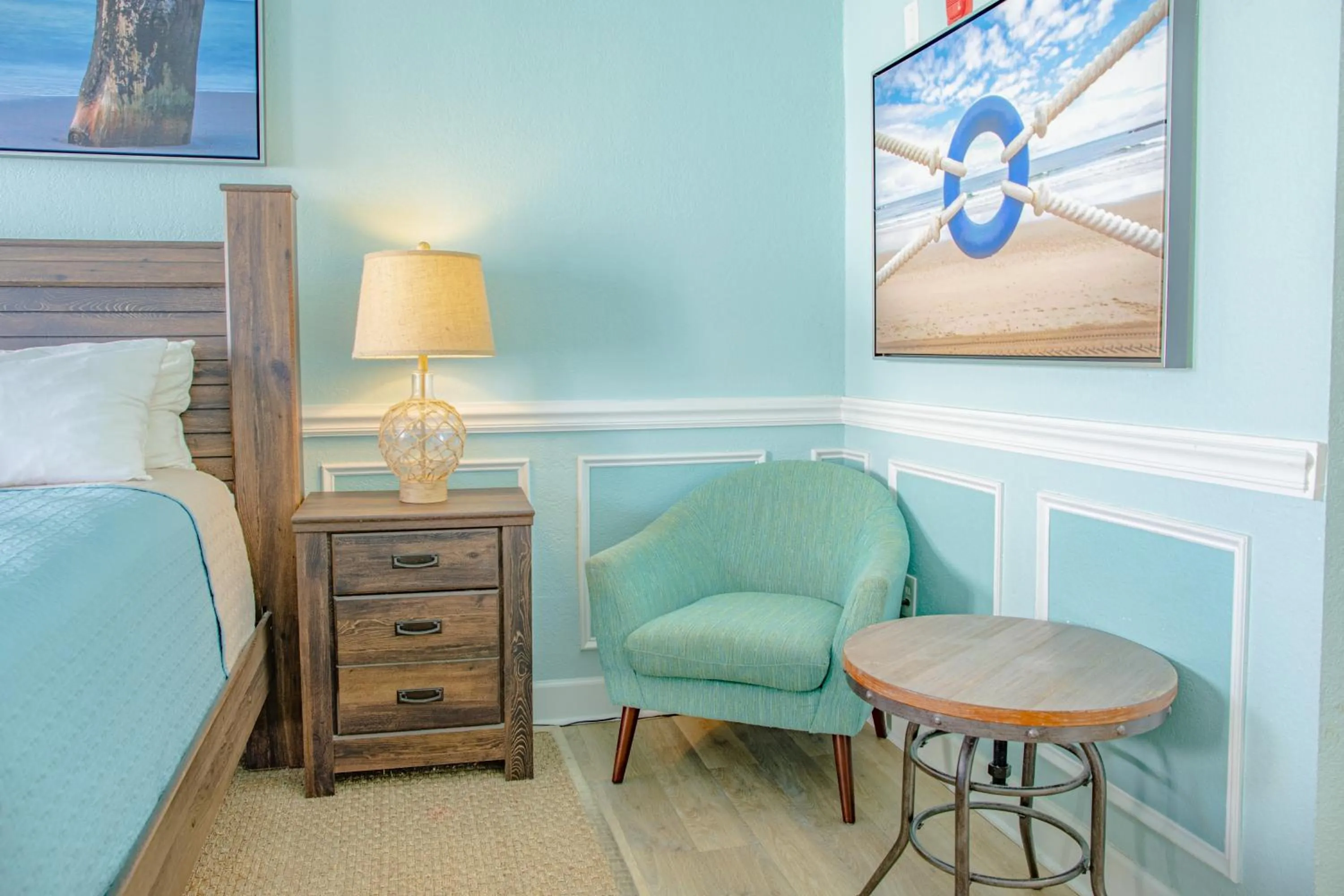 Seating area, Bed in Sea and Breeze Hotel and Condo