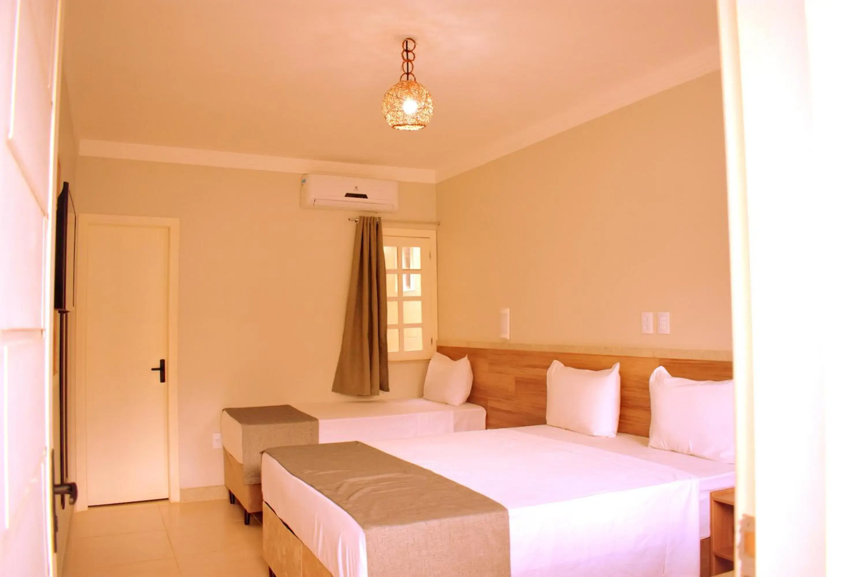 Bed in Tropical Mar Hotel Bed in Tropical Mar Hotel