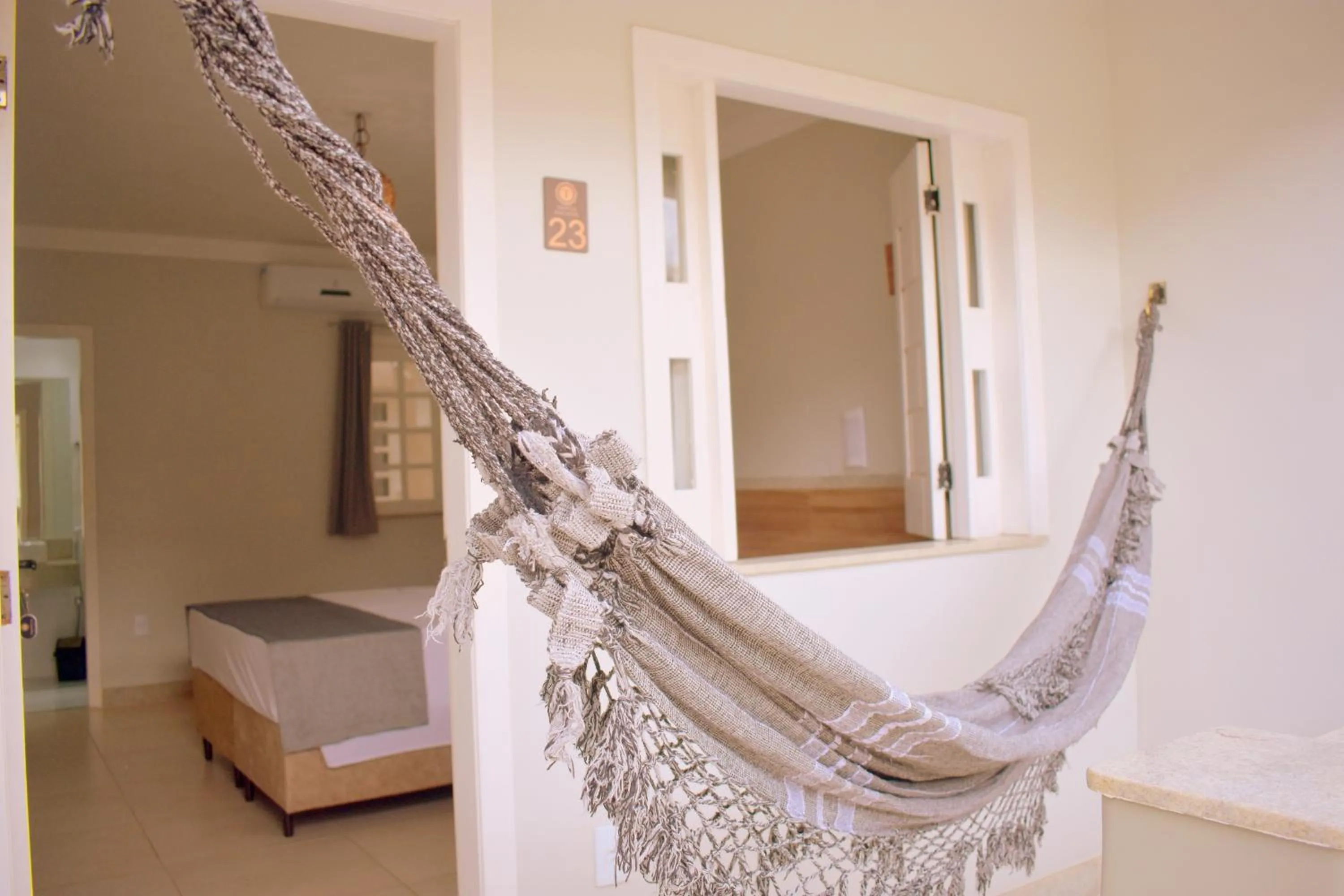 Bed in Tropical Mar Hotel