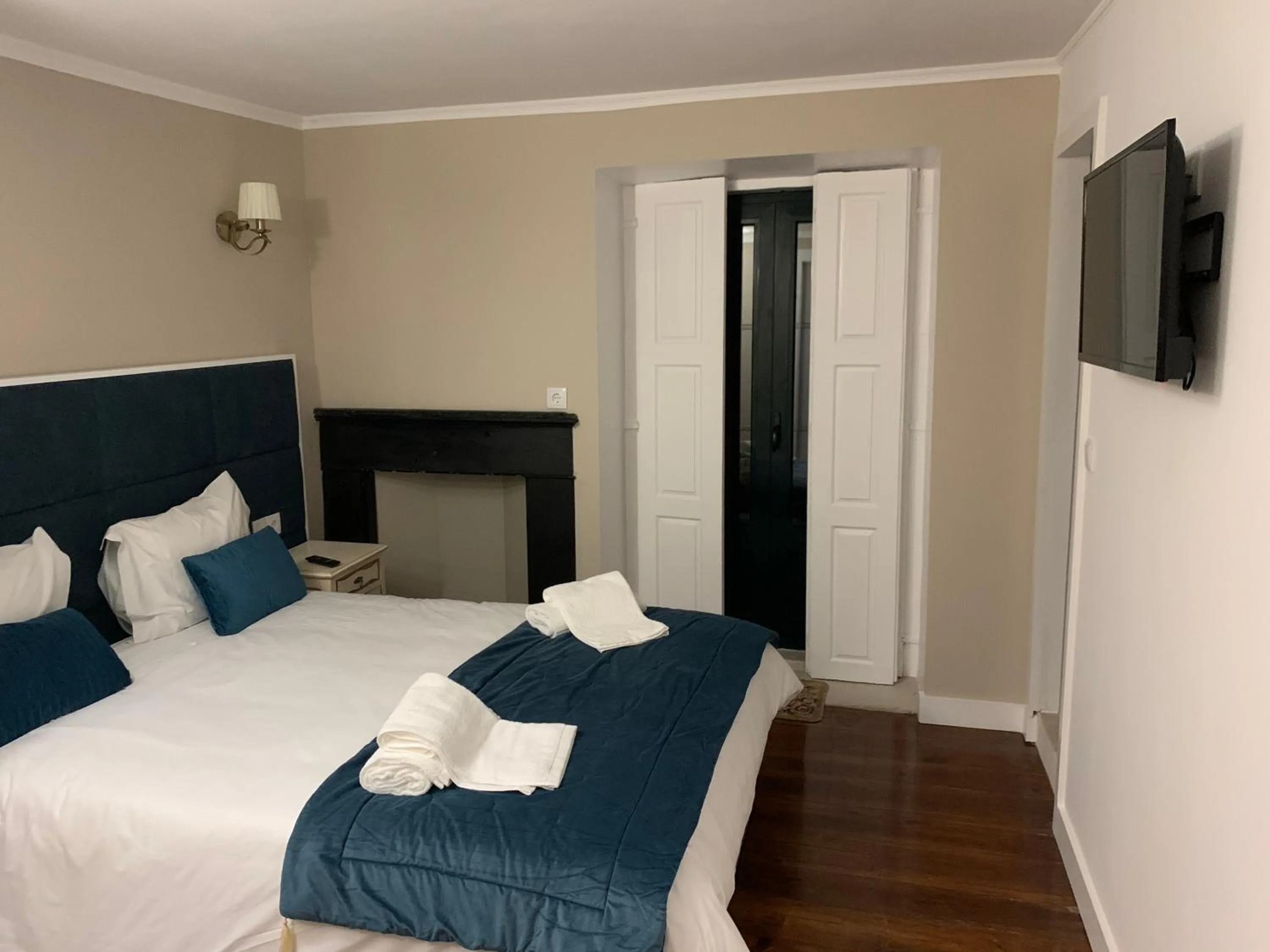 Bed in A Portuguesa Guest House